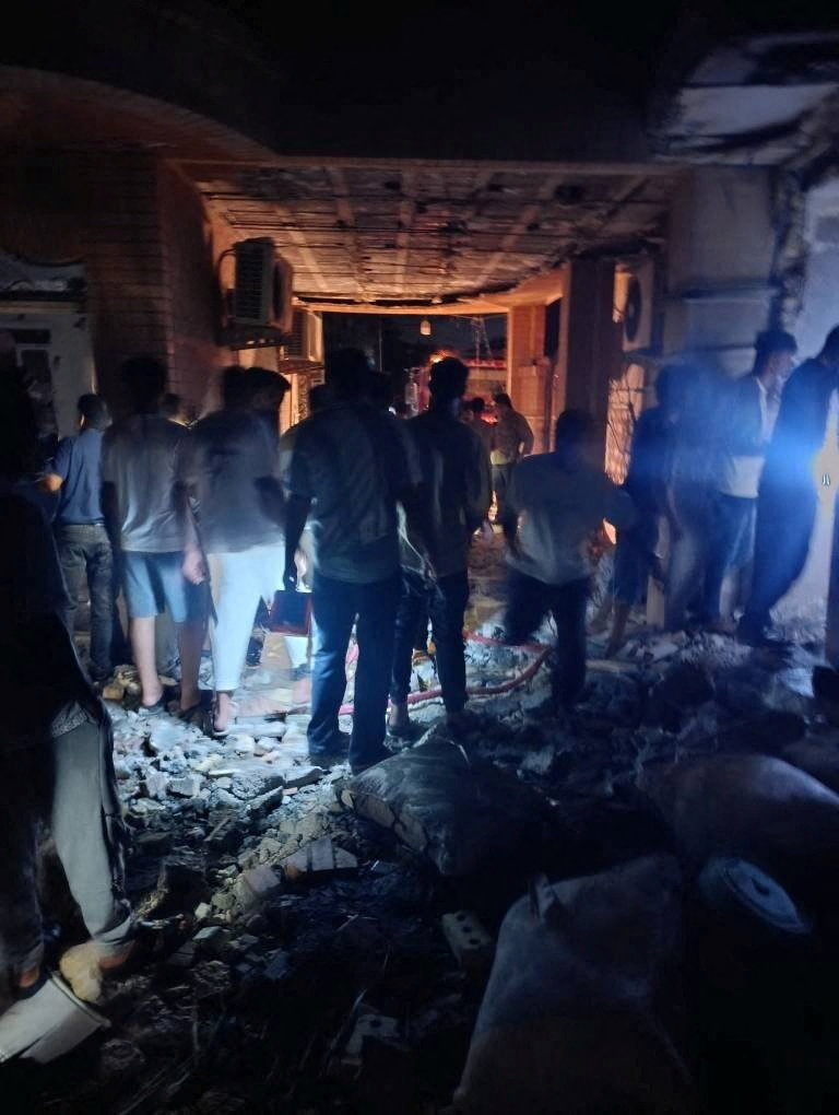People gather at the site in the aftermath of a reported attack in Kuhistik, Sirik, Iran, September 1, 2026. Iranian Red Crescent Society/Handout via REUTERS THIS IMAGE HAS BEEN SUPPLIED BY A THIRD PARTY. NO RESALES. NO ARCHIVES. MANDATORY CREDIT. VERIFICATION: - Building that matched corroborating eyewitness video and the road layout and electric tower nearby matched the archive and satellite imagery of the area. - Iranian media said telecommunications infrastructure and residential area were damaged after an attack on September 1. - No old results were found posted online before September 1.