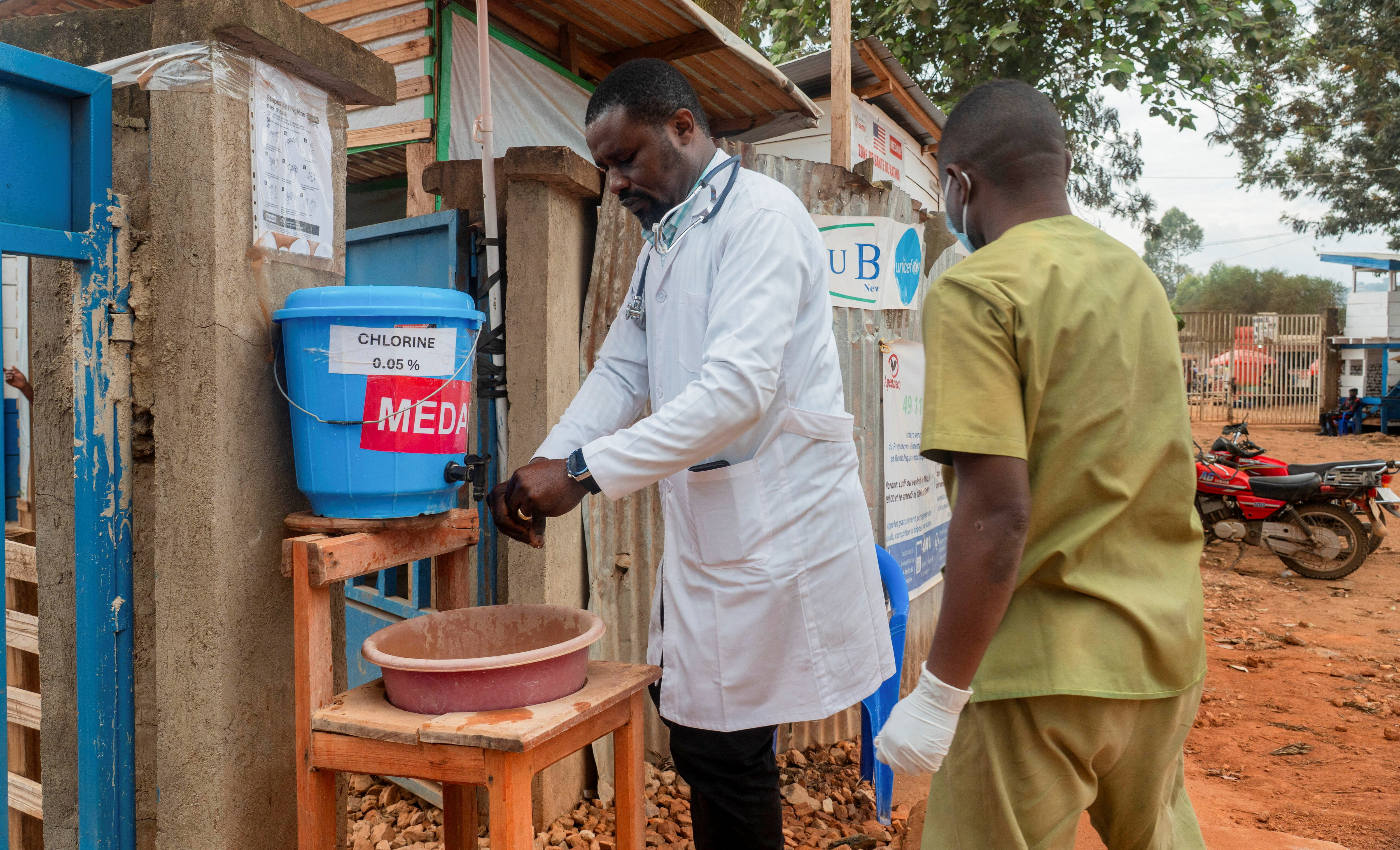 Dr. Papy Mafuta, medical director of Katwa hospital, sanitizes as aid agencies intensify efforts to contain a new Ebola outbreak involving the Bundibugyo strain, in the Mutiri quarter of Butembo, North Kivu province, Democratic Republic of Congo, September 10, 2026. REUTERS/Gradel Muyisa Mumbere