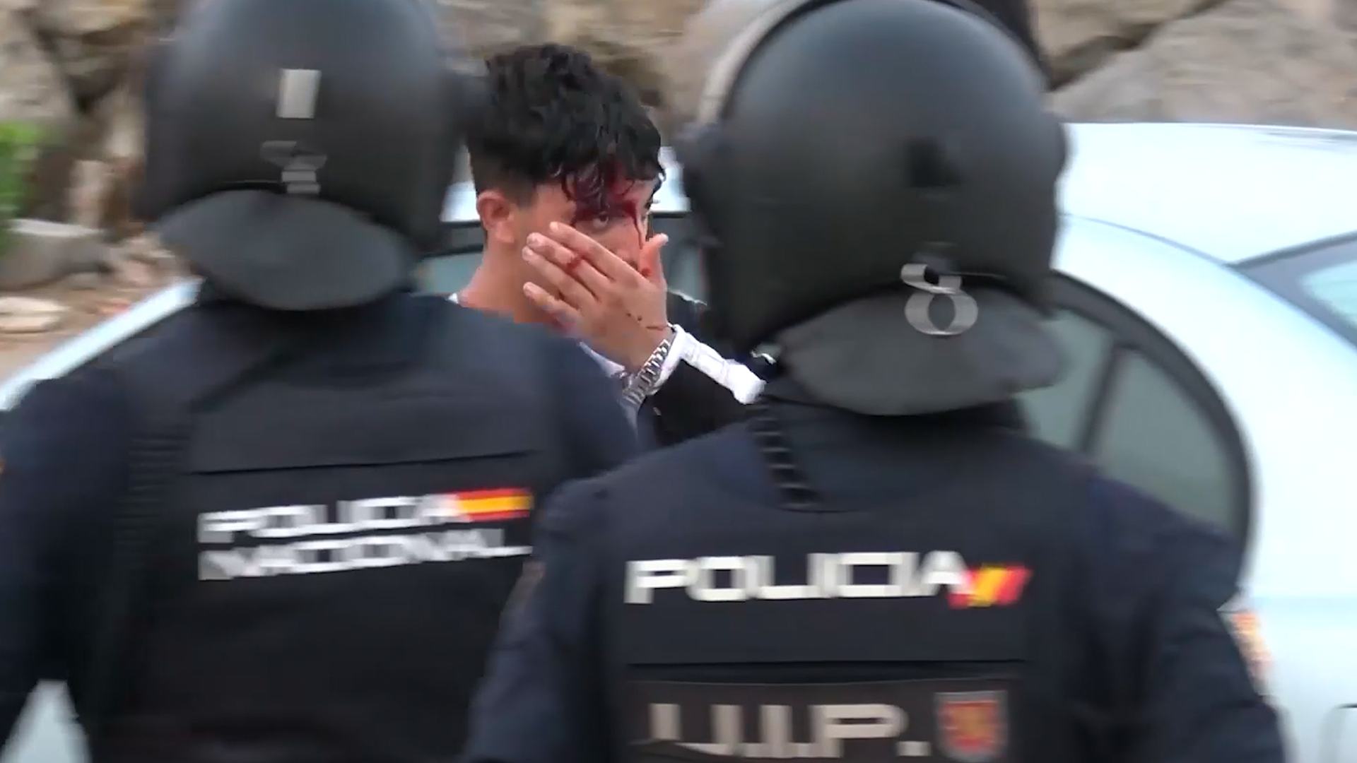 Police hit migrants with batons during camp transfer in Ceuta