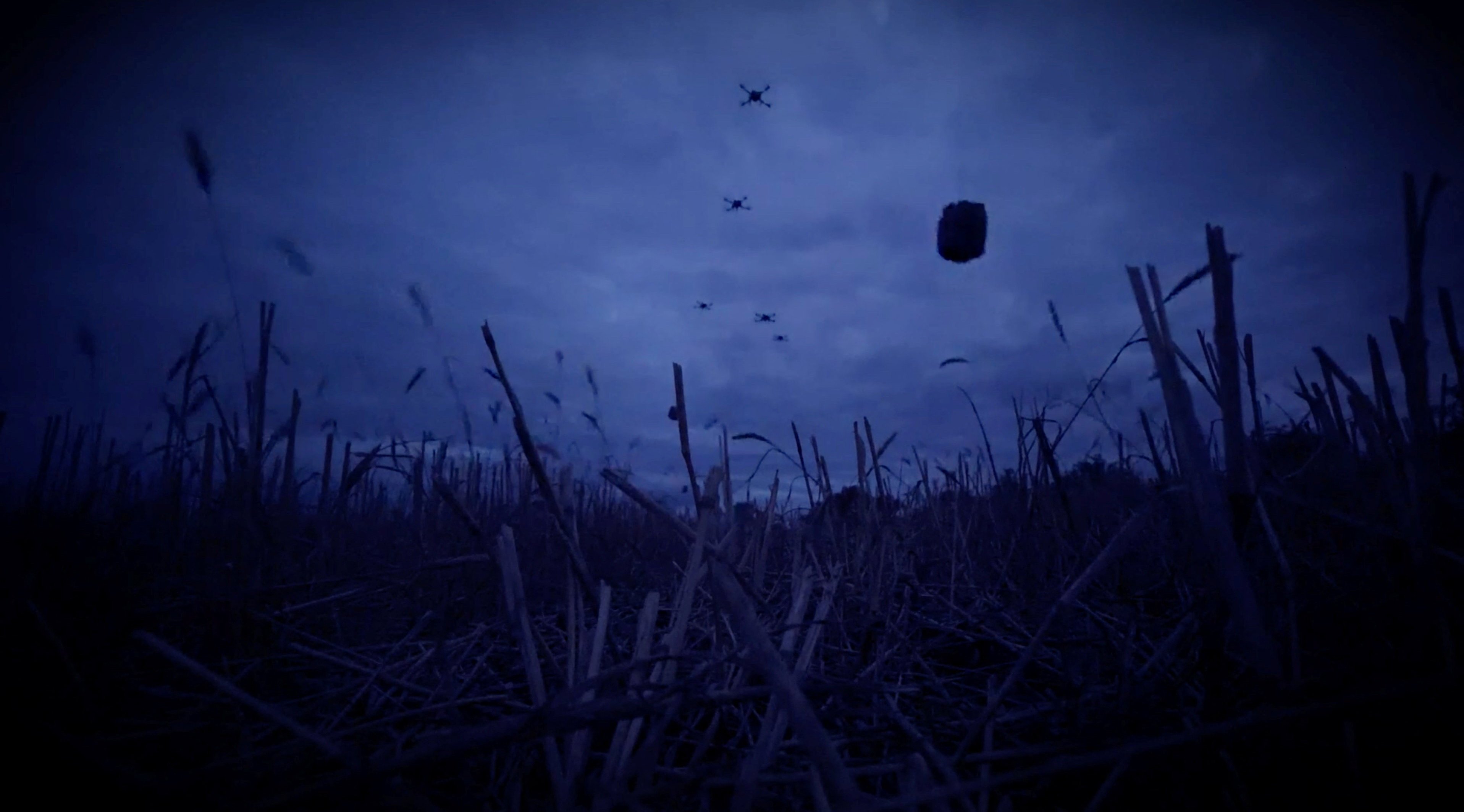 Drones carrying food packages fly over a location given as Oleshky, Kherson Region, Russian-controlled Ukraine, in this still image obtained from a video released on September 27, 2026. Oleksandr Prokudin, head of Kherson Regional Military Administration via Telegram/Handout via REUTERS THIS IMAGE HAS BEEN SUPPLIED BY A THIRD PARTY. MANDATORY CREDIT. VERIFICATION: Location partially verified by church spire, lantern and building exterior, nearby buildings and road layout match archive image and satellite images. Date of footage not verified. No older results found posted online before September 27.