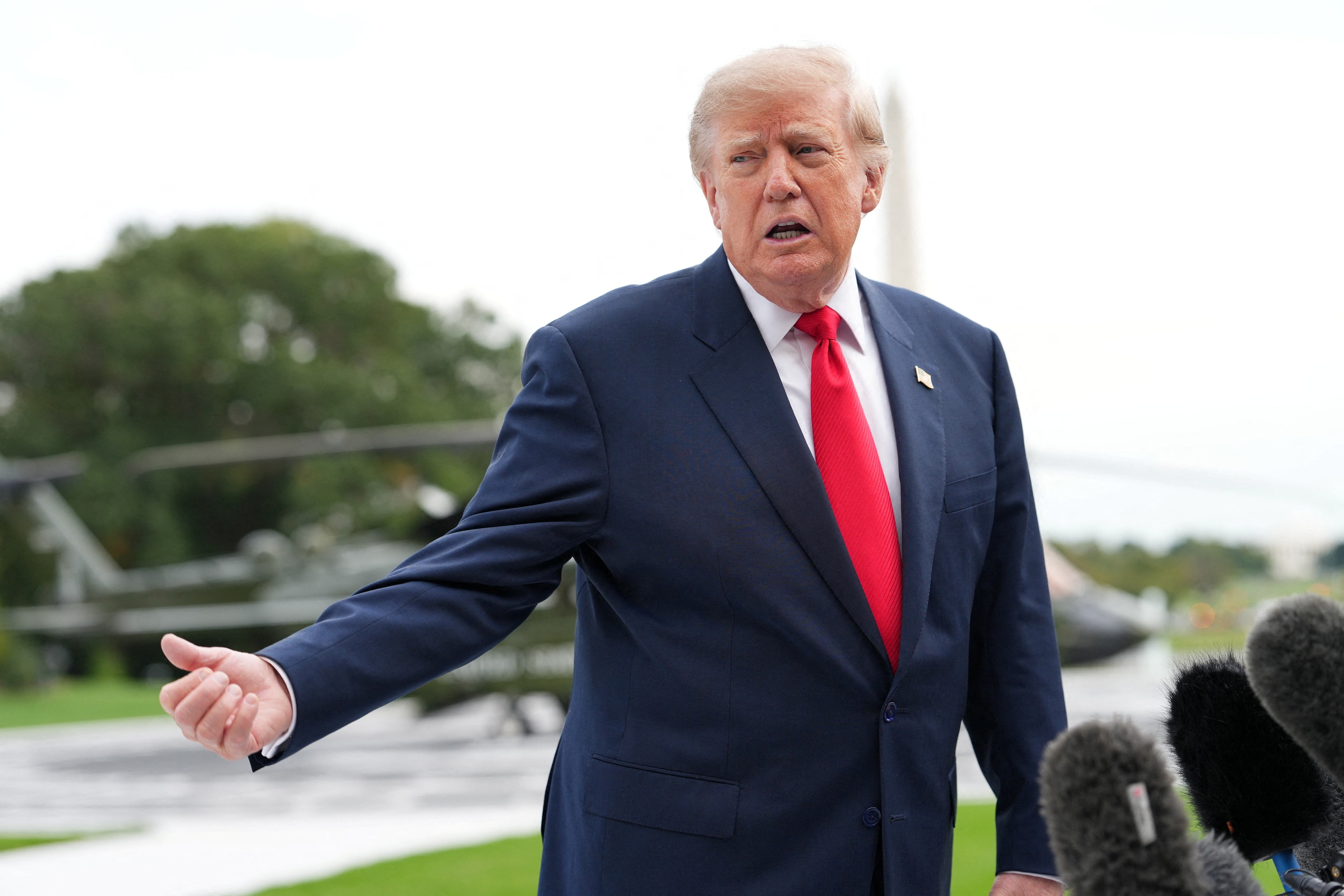 US President Donald Trump speaks to the media before boarding Marine One as he departs the White House for Joint Base Andrews en route to Syracuse, New York, on the South Lawn of the White House in Washington, DC, US, October 9, 2026. REUTERS/Eric Lee