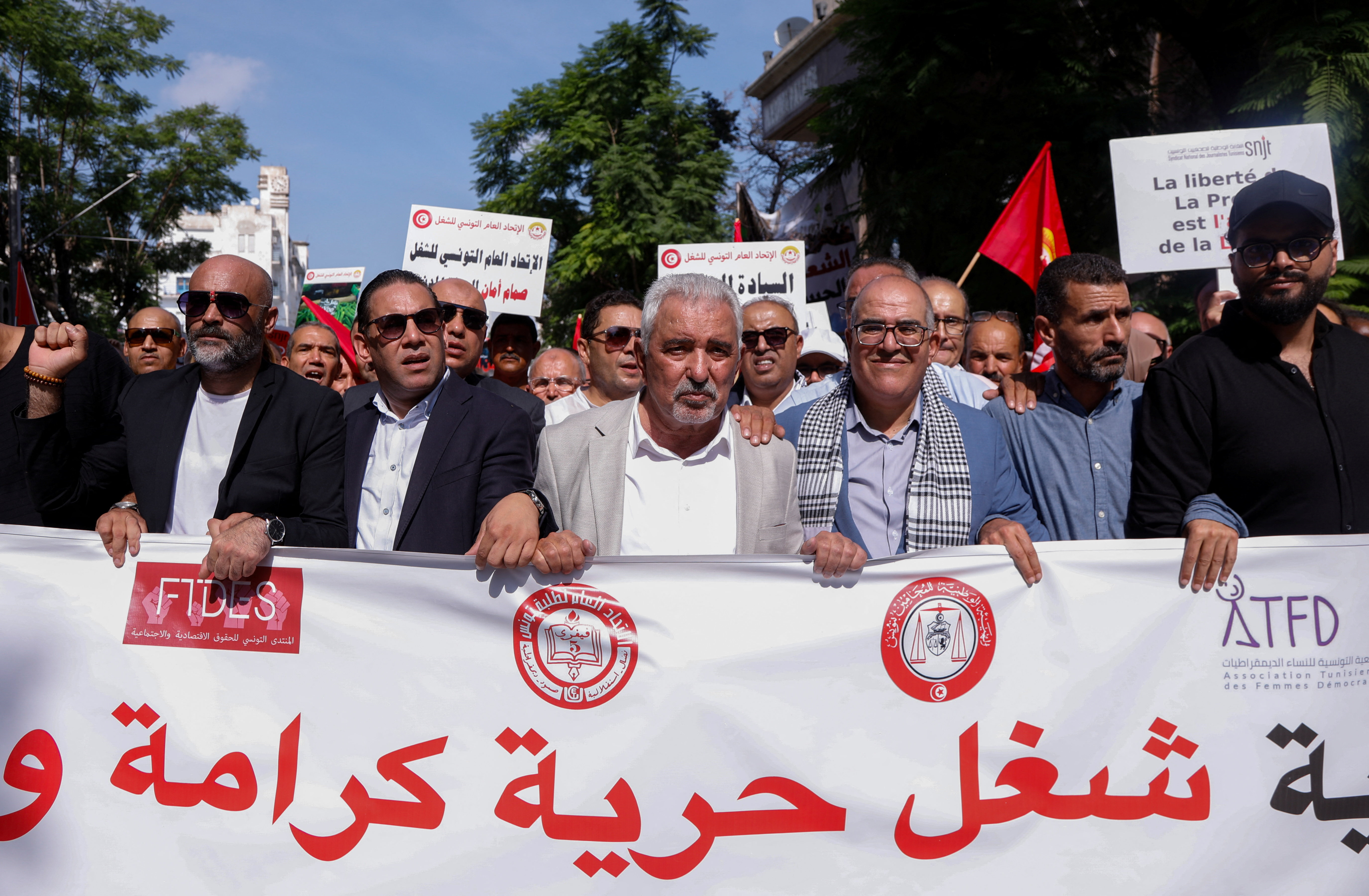 Tunisian General Labour Union (UGTT) Secretary-General Salah Eddine Salmi and other demonstrators protest against President Kais Saied in Tunis on Saturday