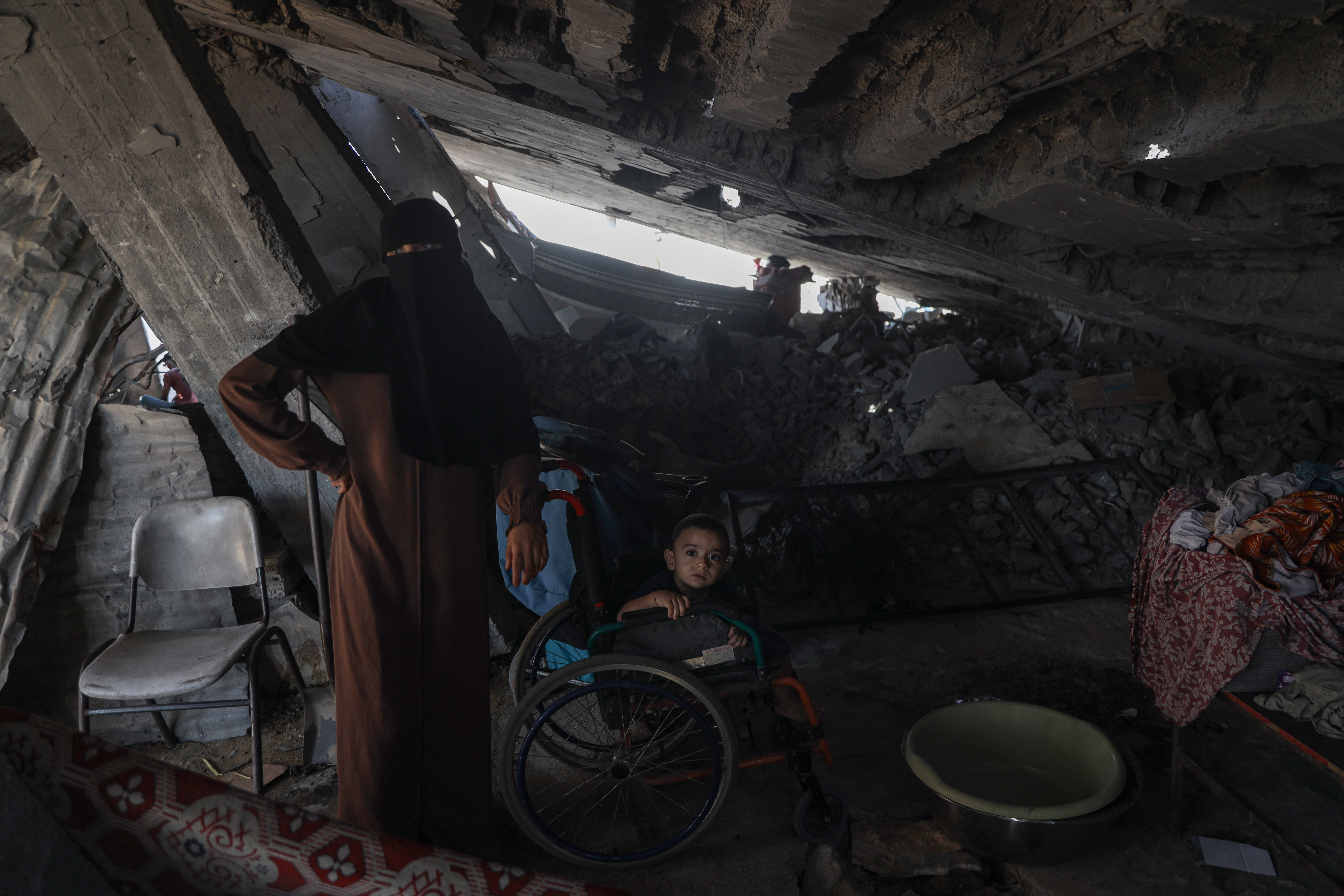 Asma Ali says the advancing Yellow Line has left her family uncertain where they can find safety. [Abdelhakim Abu Riash/Al Jazeera]