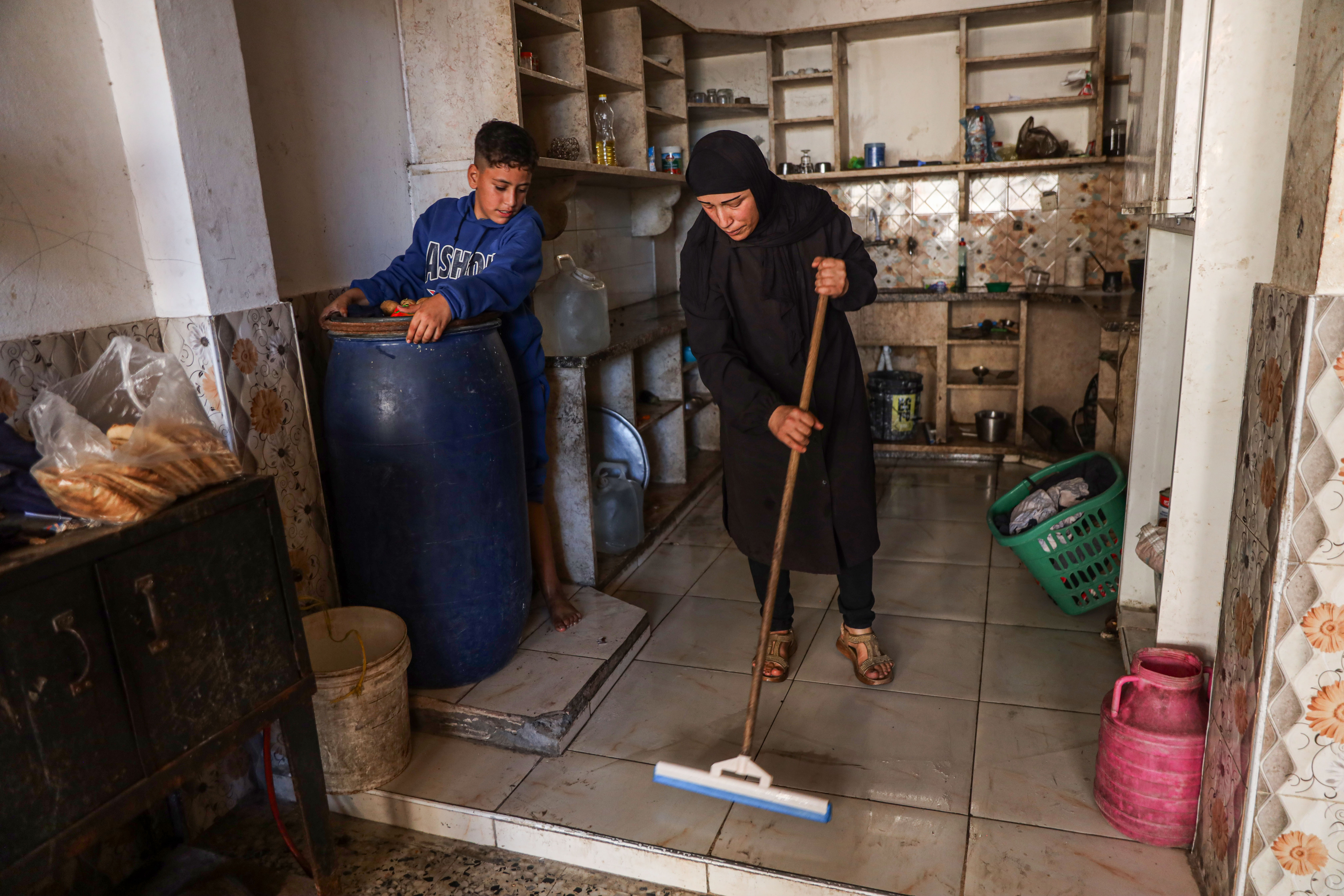 Despite having a medical referral, Hiba Musbah is still waiting to leave Gaza for treatment and hoping to recover so she can devote more time to caring for her three children again