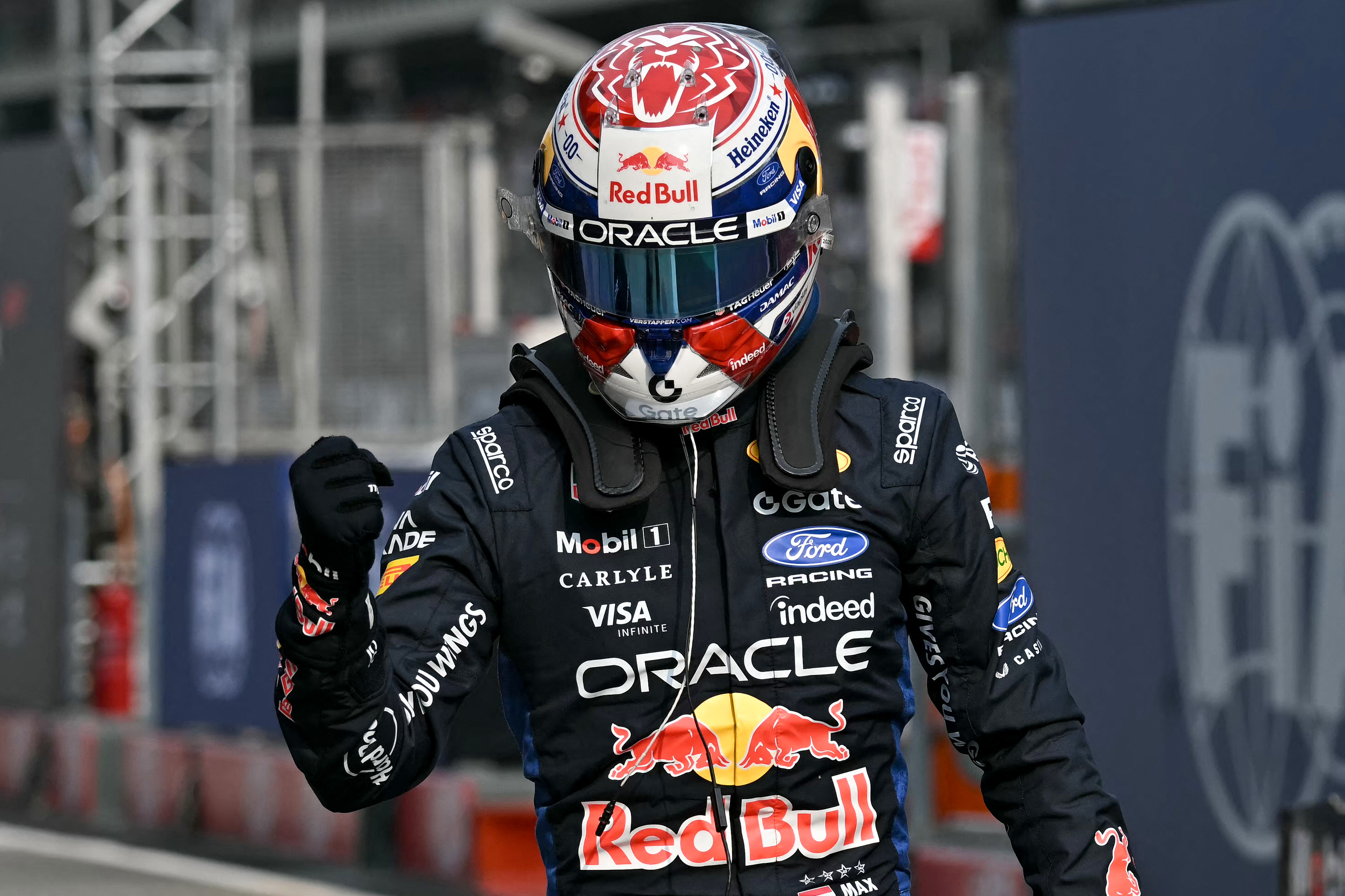 Red Bull Racing's Dutch driver Max Verstappen gestures after qualifying in pole position in the qualifying session of the Formula One Bahrain Grand Prix in Sepang on October 3, 2026. (Photo by Lillian SUWANRUMPHA / AFP)