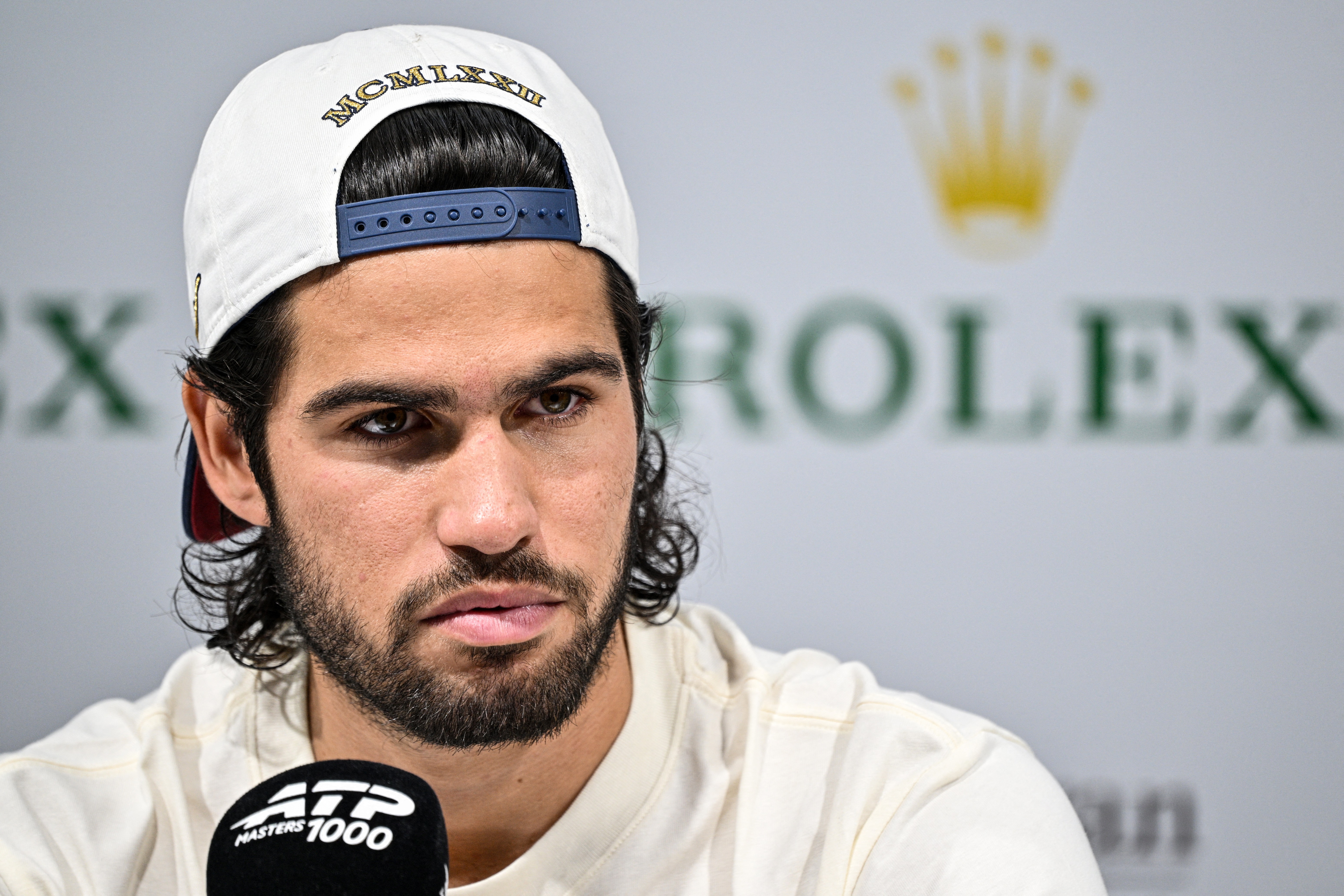 Spain's Carlos Alcaraz speaks during a press conference at the Shanghai Masters tennis tournament in Shanghai on October 8, 2026. (Photo by Hector RETAMAL / AFP)
