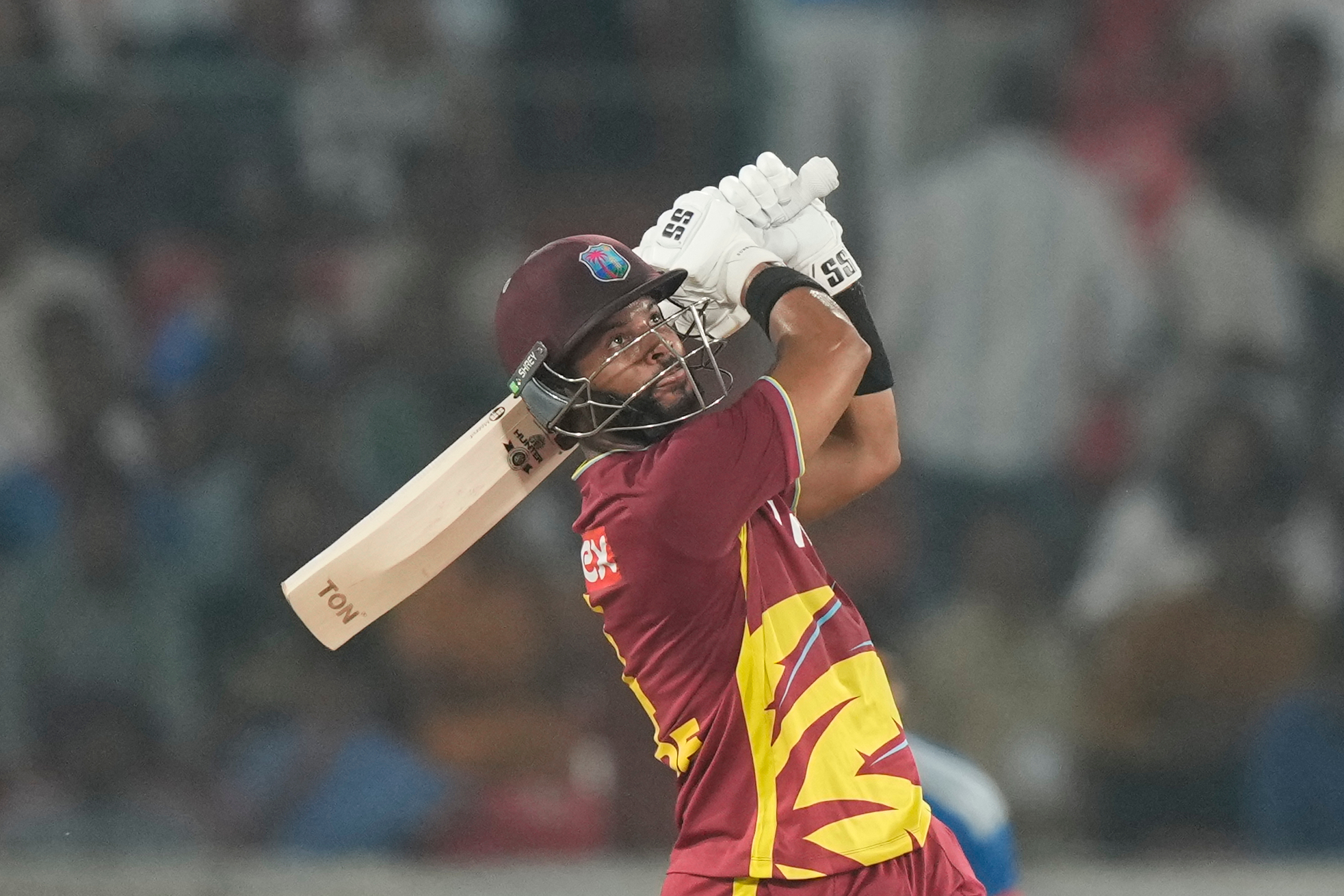 West Indies' captain Shai Hope hits a six during the fourth T20 cricket match between India and West Indies