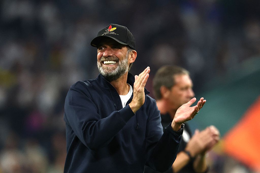 Germany's national team coach Jürgen Klopp is celebrating after the game