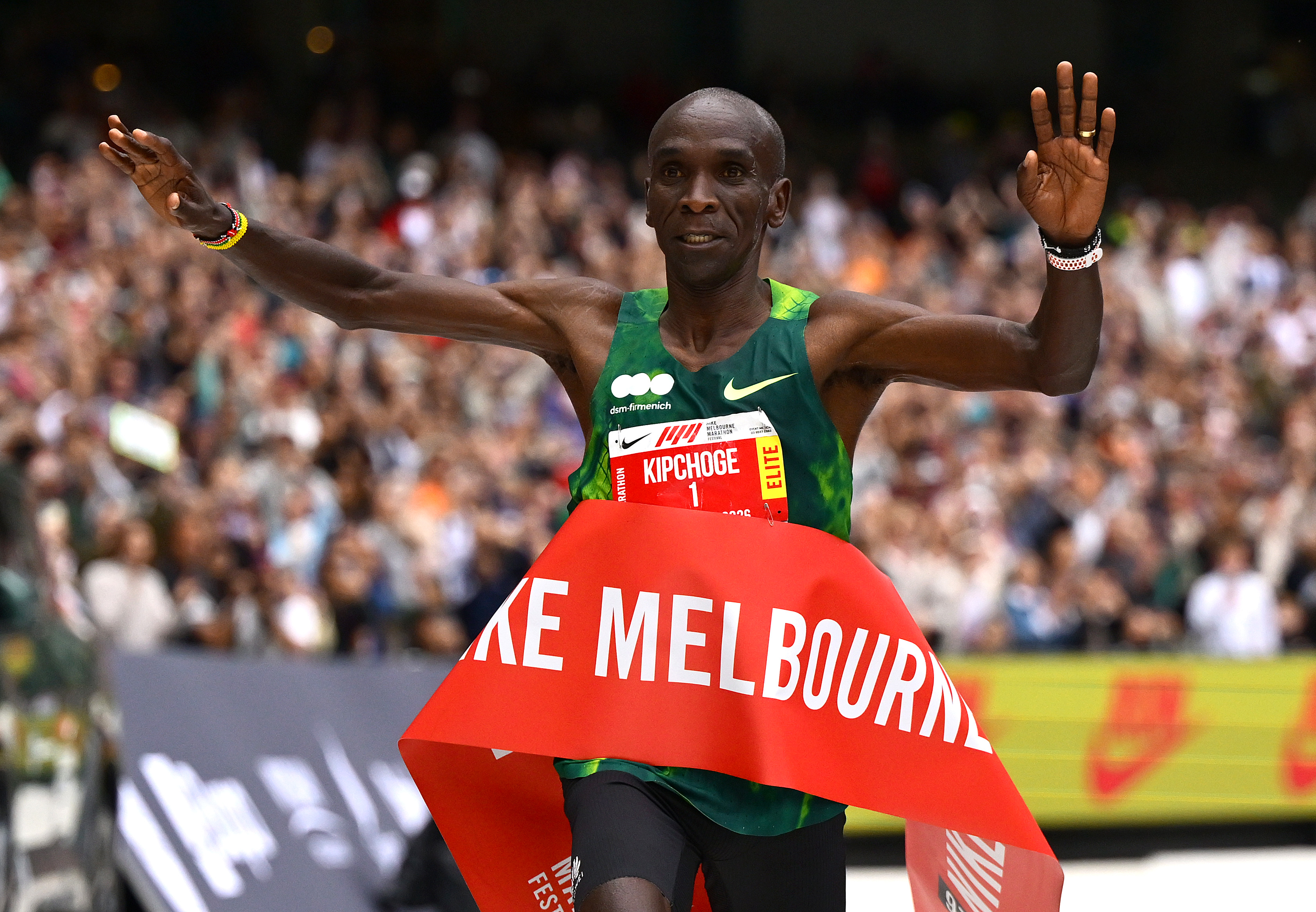 Eliud Kipchoge of Kenya crosses the line to win the Melbourne Marathon