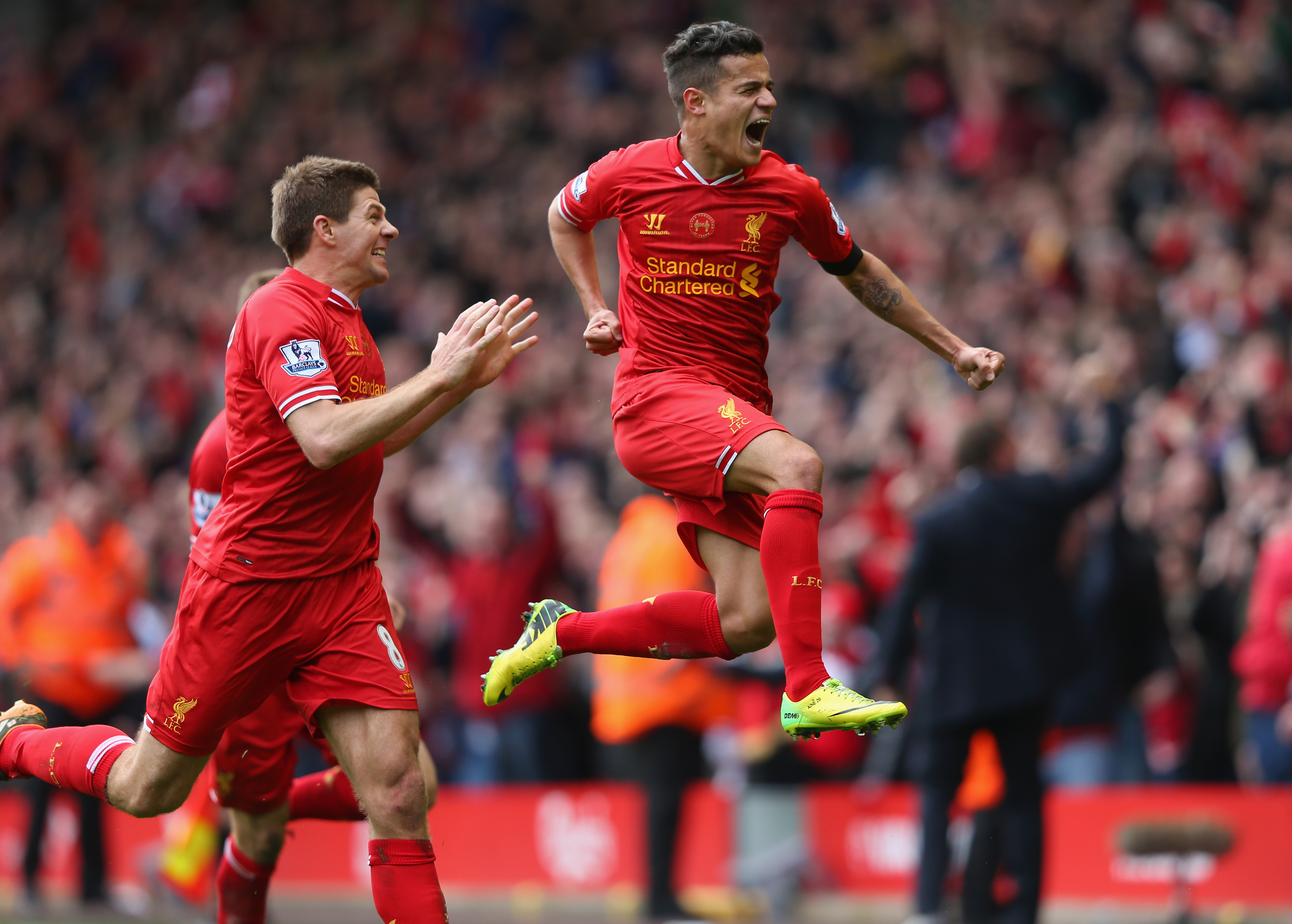 LIVERPOOL, ENGLAND - APRIL 13: Philippe Coutinho of Liverpool celebrates scoring his team's third goal during the Barclays Premier League match between Liverpool and Manchester City at Anfield on April 13, 2014 in Liverpool, England. (Photo by Alex Livesey/Getty Images)