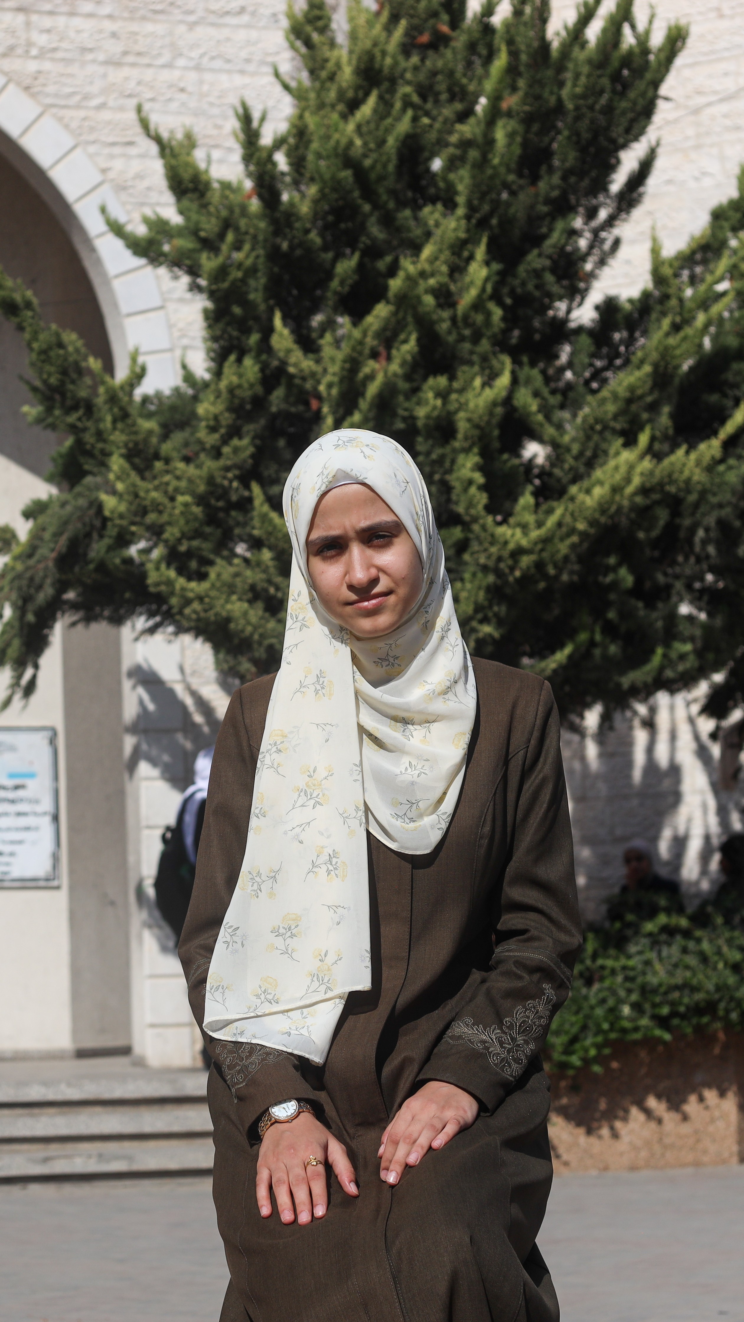 Lina Yunis Abd al-Qader was once known as "the tall Lina" to distinguish her from another classmate with the same name