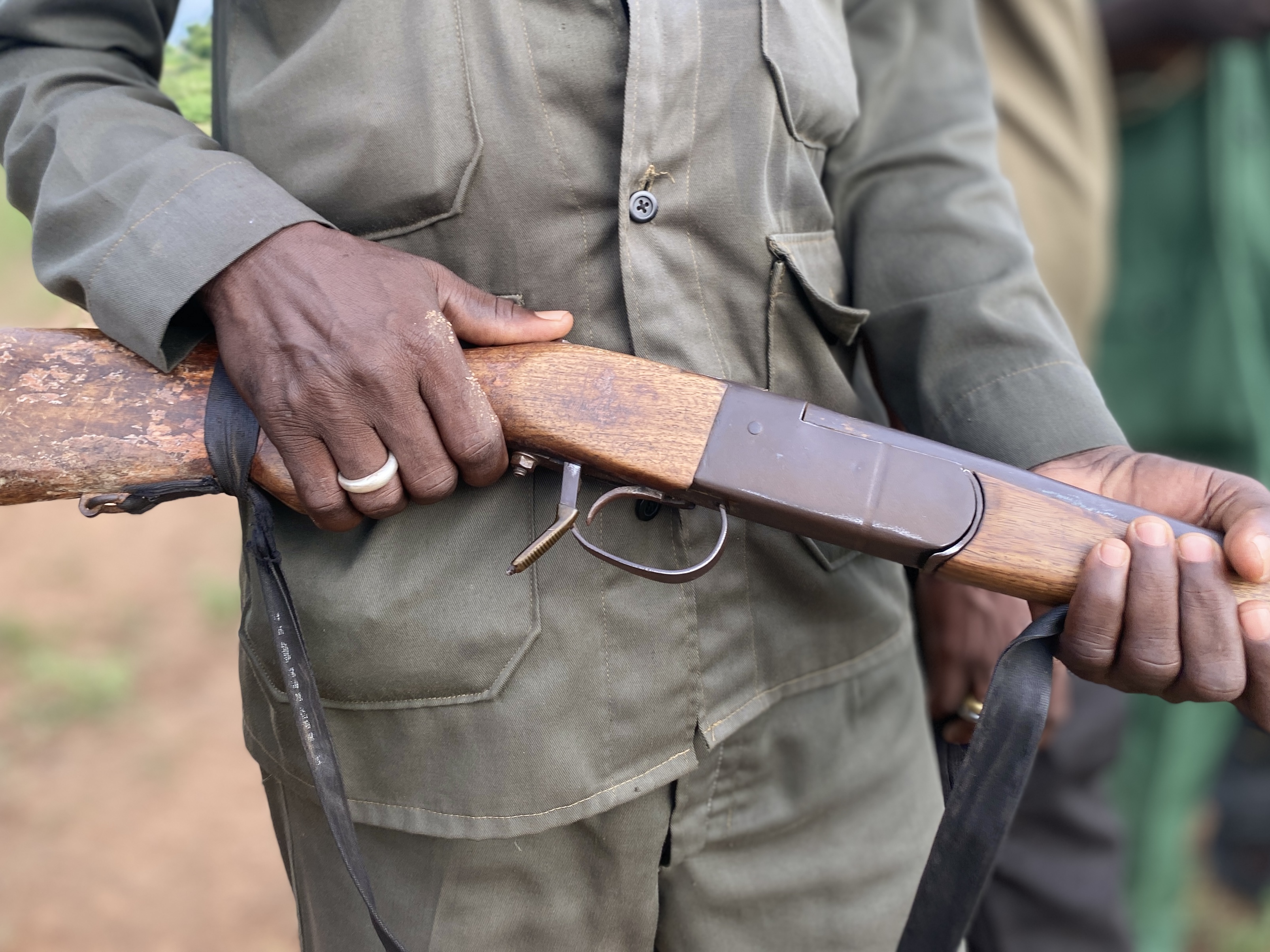 A member of Pulaku holds a locally made firearm during a training exercise outside Yola, northeastern Nigeria