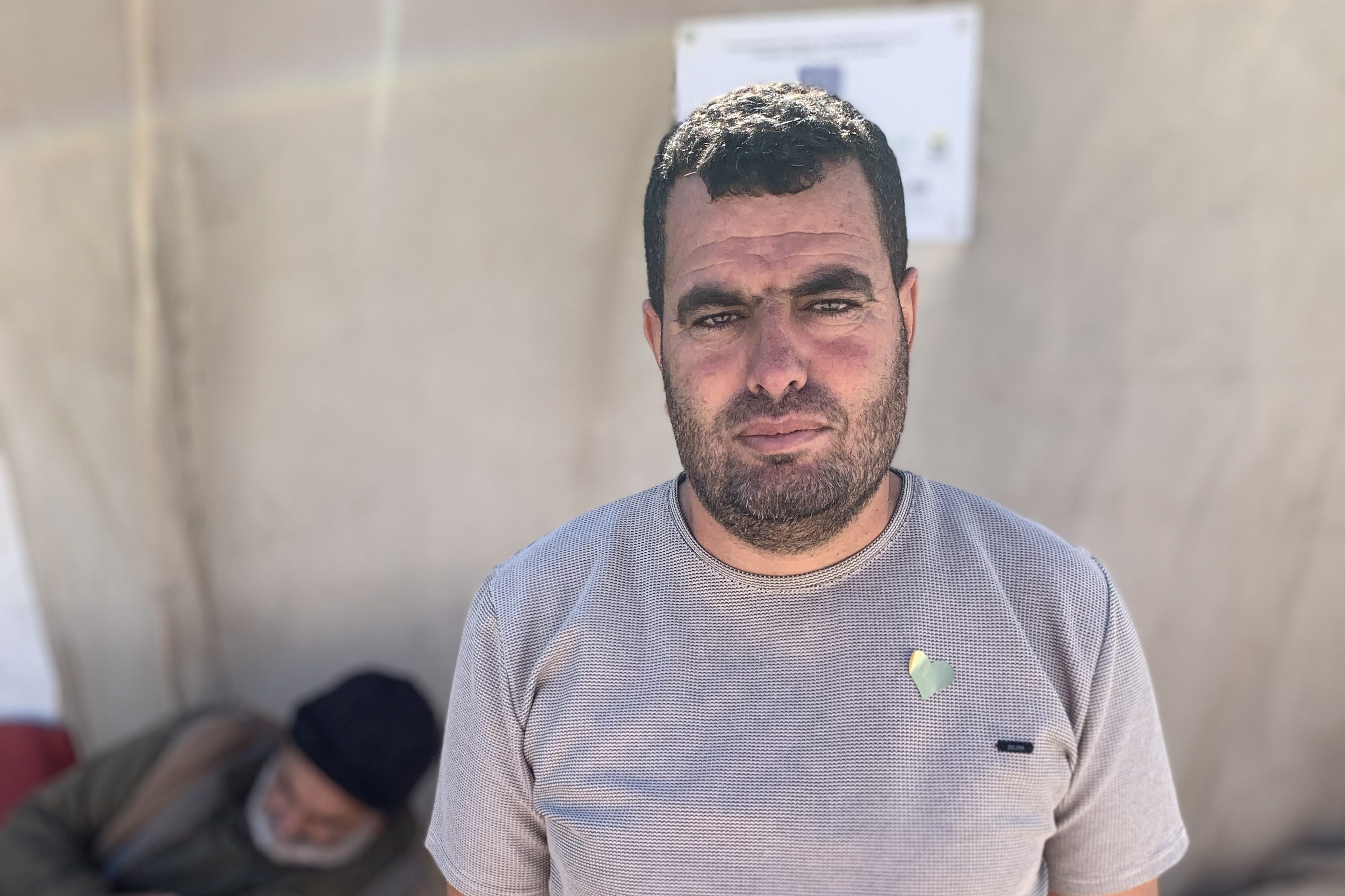 Nasser Nawajeh tries to bring supplies to Yousef Shanaran, but is often unable to get past the siege on the latter’s house [Al Jazeera]
