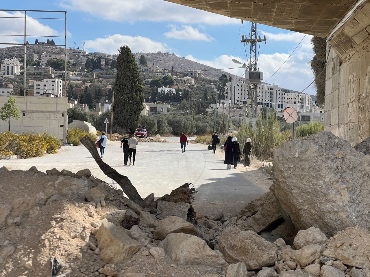 Rubble placed by Israeli forces to block one of the entrances into Madama