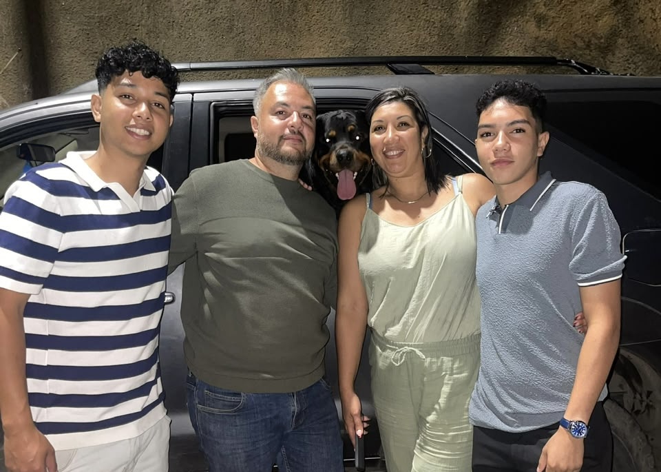 Ricardo Contreras, right, and Andres, left, pose with their family before the fatal earthquake [Courtesy of the Contreras family]