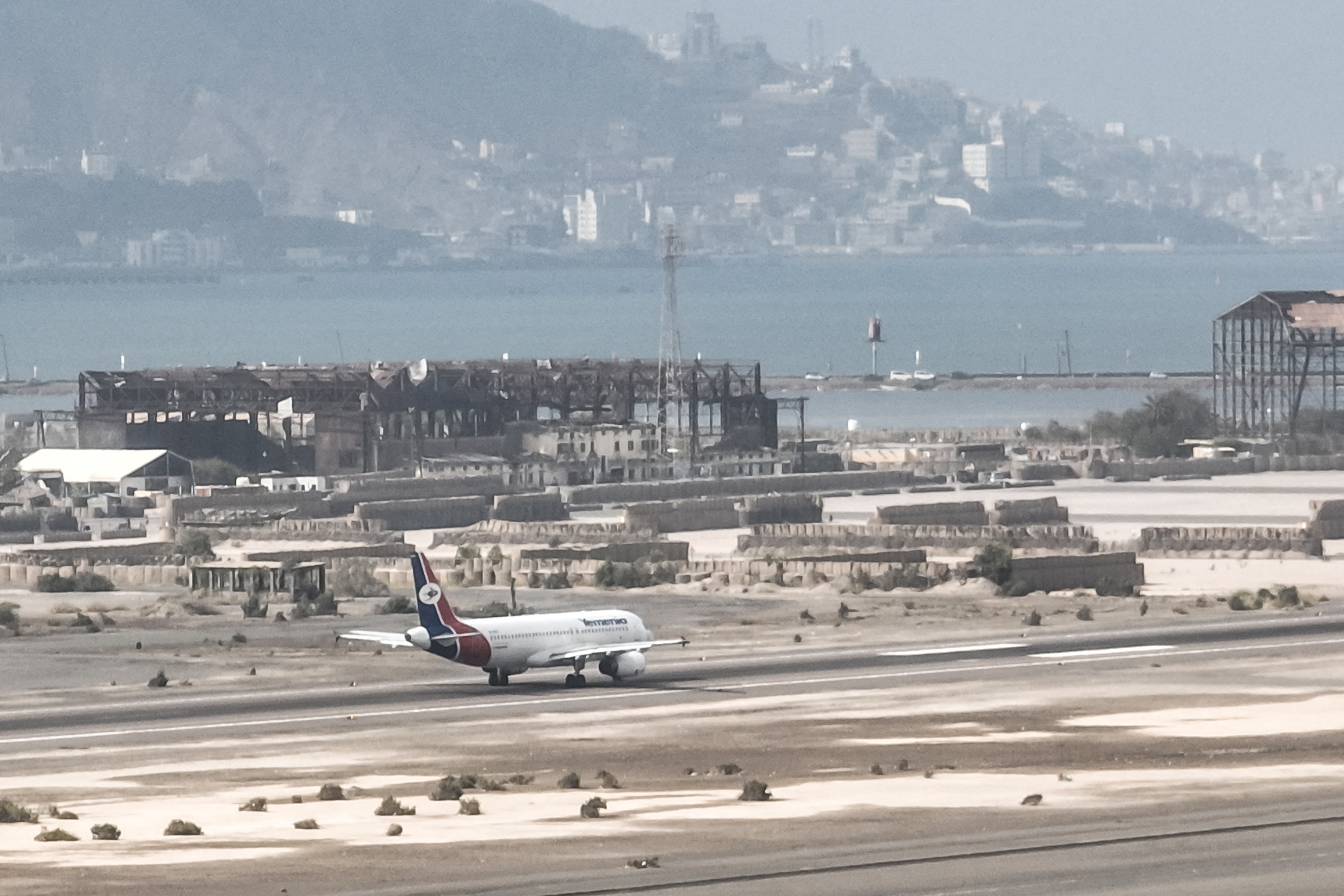 A plane taxis along the runway at Aden Airport on October 21, 2026.