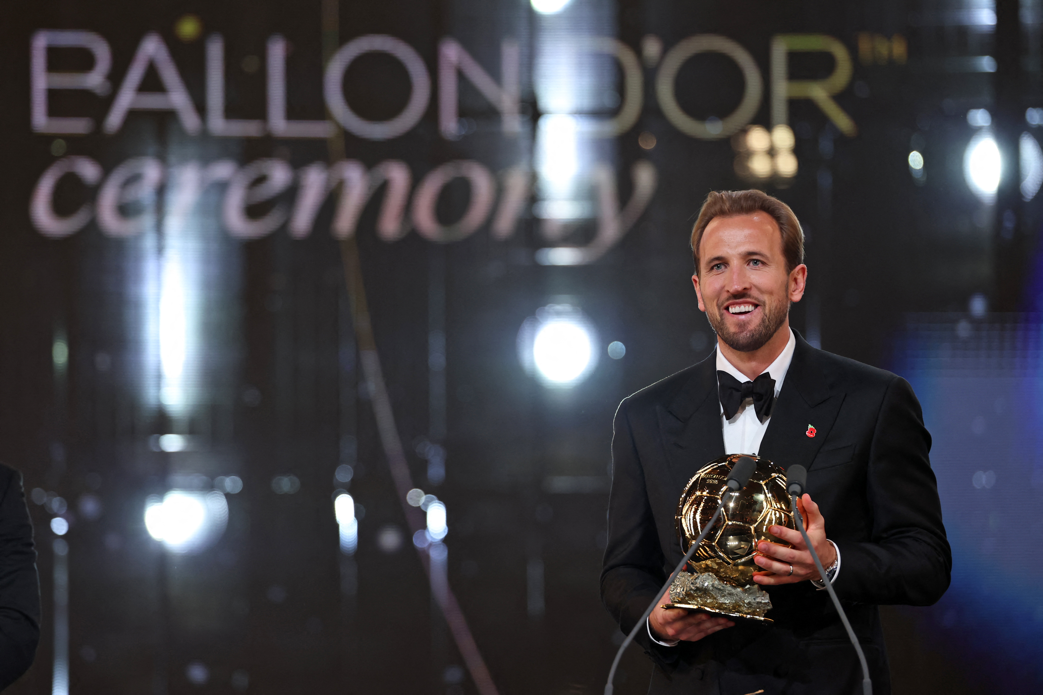 England and Bayern Munich forward Harry Kane reacts after receiving the Ballon d'Or award.