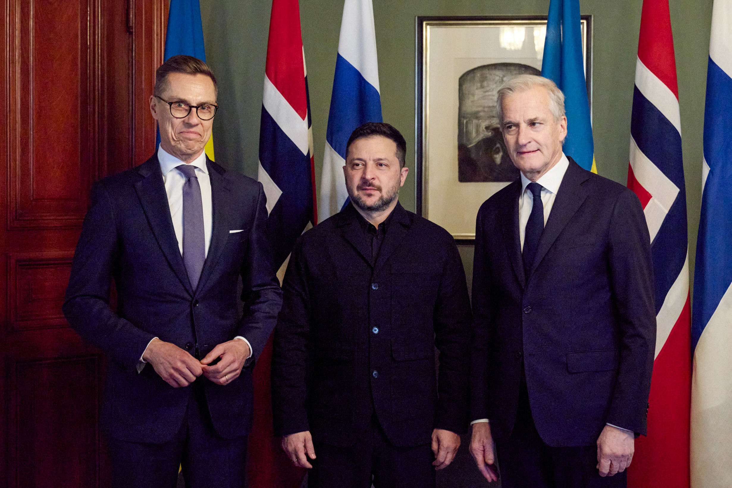 In this handout photograph taken and released by the Ukrainian Presidential Press Service on October 20, 2026 Norway's Prime Minister Jonas Gahr Store (R), Ukraine's President Volodymyr Zelensky (C) and Finland's President Alexander Stubb (L) pose for a photo prior to their meeting in Oslo.