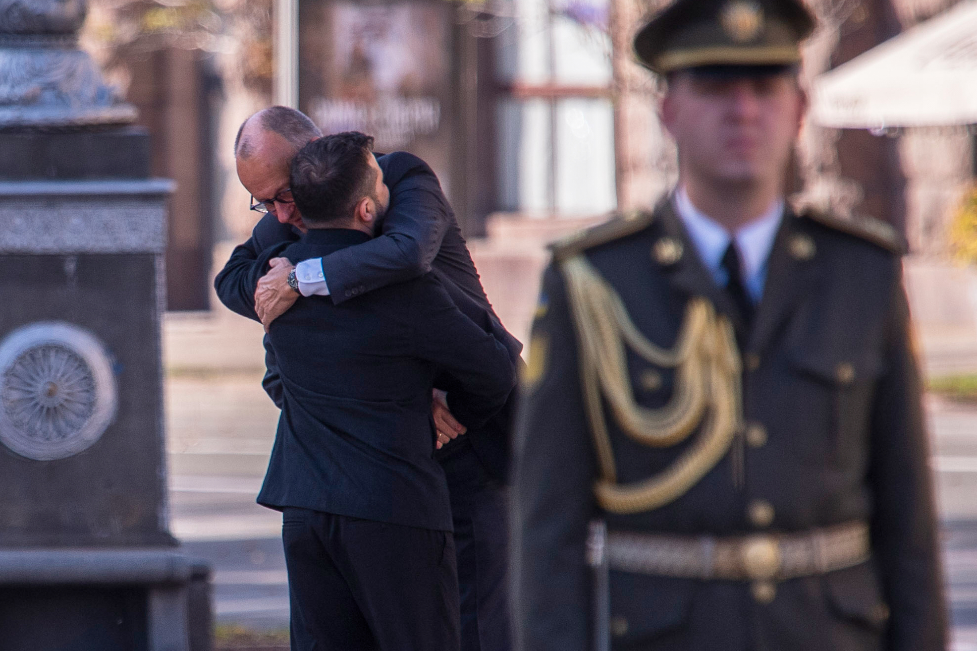 Ukraine's President Volodymyr Zelenskyy meets German Chancellor Friedrich Merz before a commemorative ceremony at the memorial of fallen Ukrainian soldiers at Independence Square in Kyiv, Ukraine, Sunday, Oct. 4, 2026. (AP Photo/Dan Bashakov)