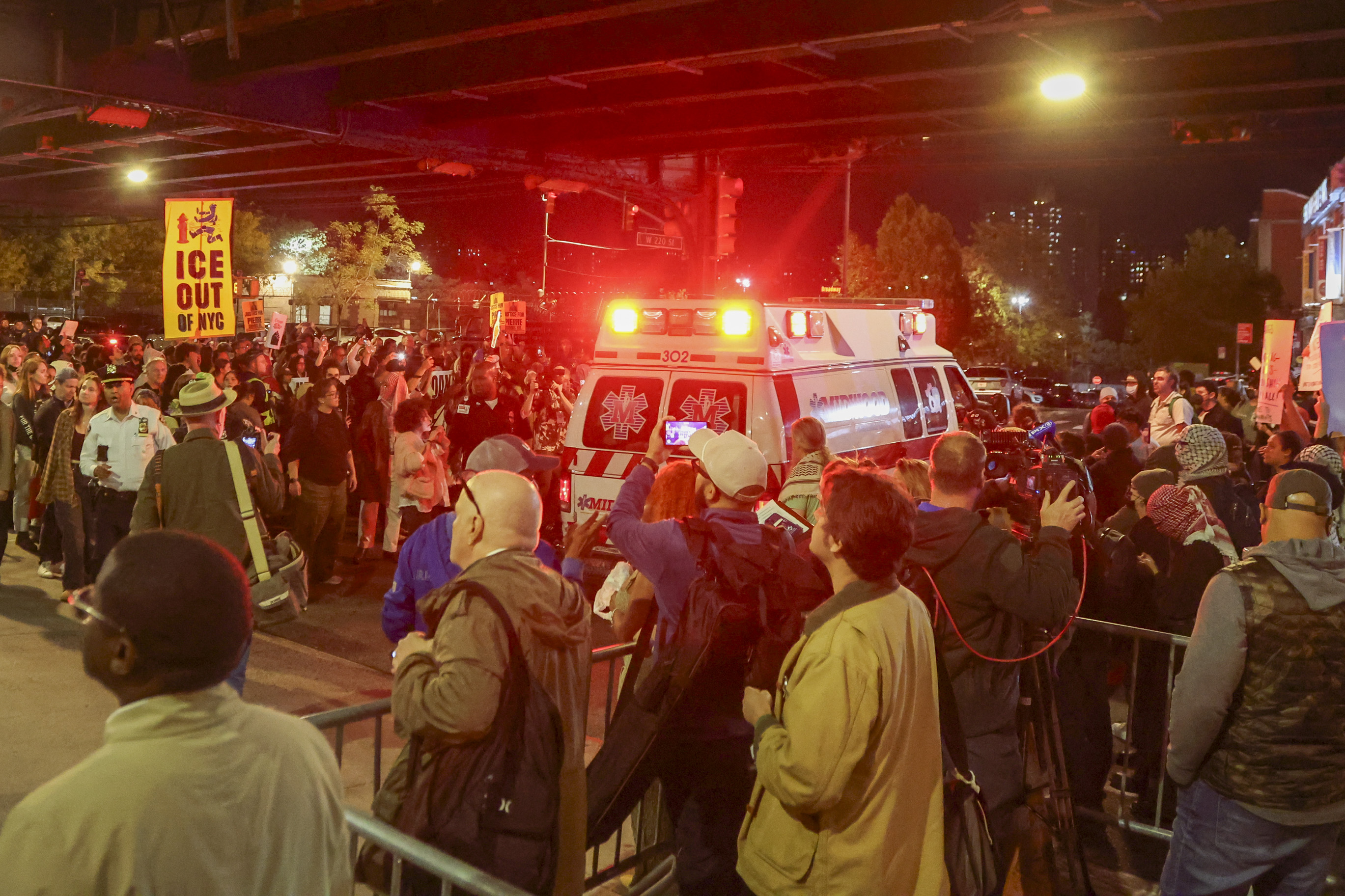 Protesters march from the scene of the shooting to a nearby hospital after an ICE officer shot a man in New York City on October 8, 2026