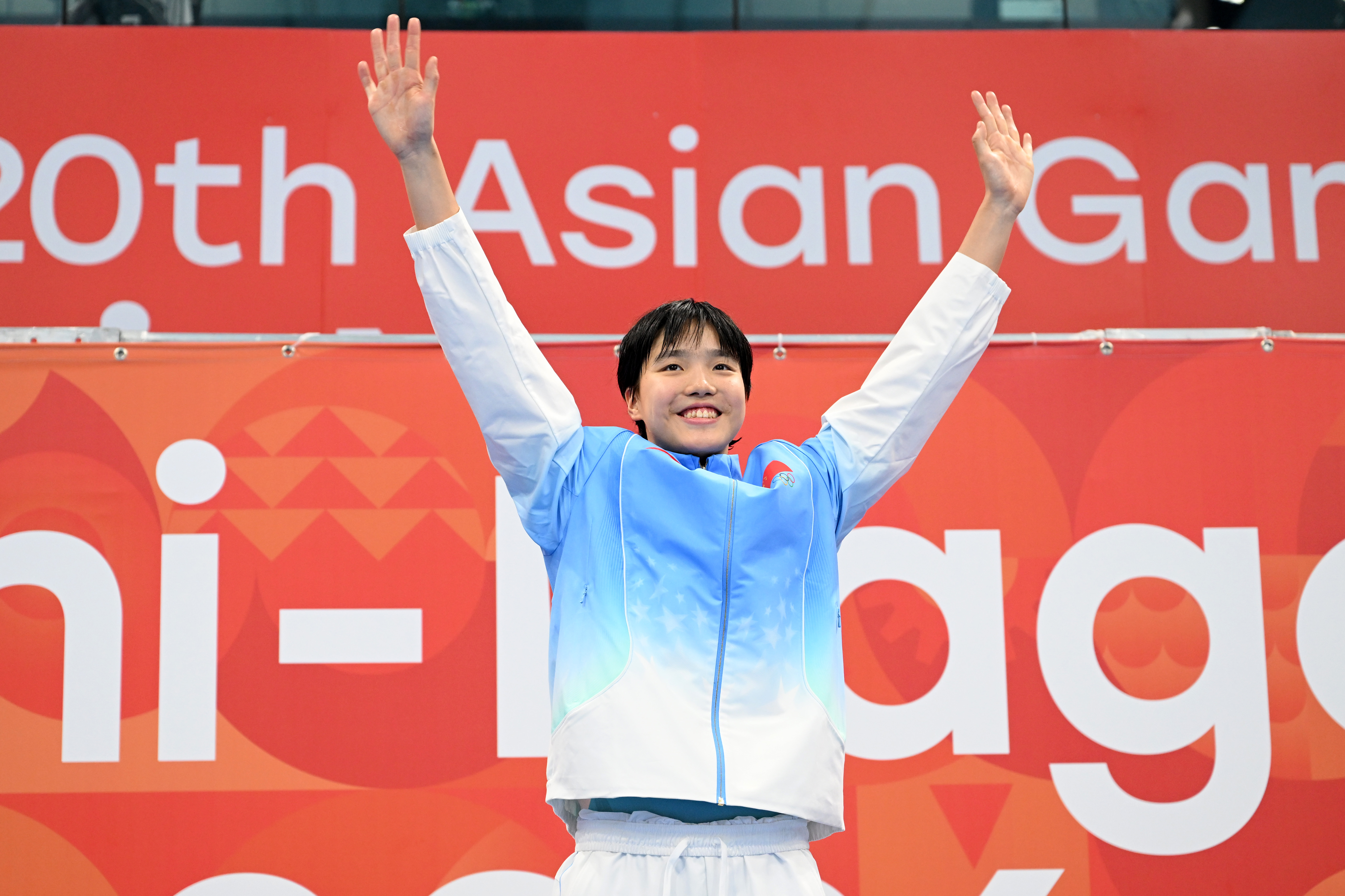 TOKYO, JAPAN - SEPTEMBER 23: Gold medalist Zidi Yu of China celebrates on the podium at the medal ceremony for the Swimming Women's 400m Individual Medley on day four of the 20th Asian Games Aichi-Nagoya at Tokyo Aquatics Centre on September 23, 2026 in Tokyo, Japan. (Photo by Atsushi Tomura/Getty Images)