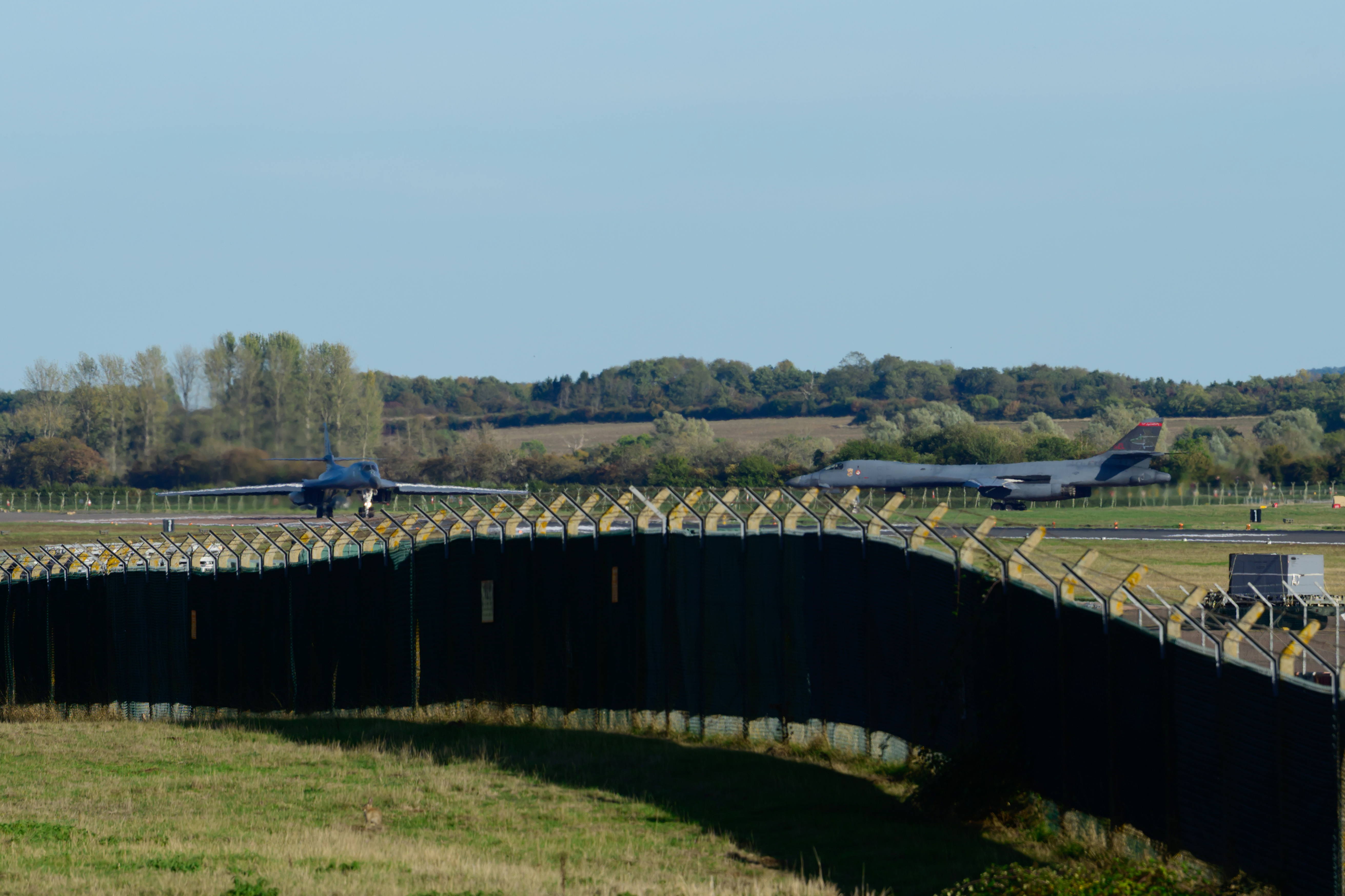 FAIRFORD, ENGLAND - OCTOBER 4: Rockwell B1 Lancer heavy bomber taxi to take off from runway 27 to depart for home at RAF Fairford on October 04, 2026 in Fairford, United Kingdom. Around a dozen US B-1B Lancer bombers remain stationed at RAF Fairford in Gloucestershire, following a significant military drawdown late last month that saw six B-52 Stratofortress bombers return across the Atlantic. The heavy aircraft are part of an American forward strike force that has used the Gloucestershire airfield to conduct missions against Iranian capabilities, with total aircraft numbers at the Gloucestershire hub previously peaking between 21 and 23 strategic bombers earlier this year. (Photo by David Bown/Getty Images)