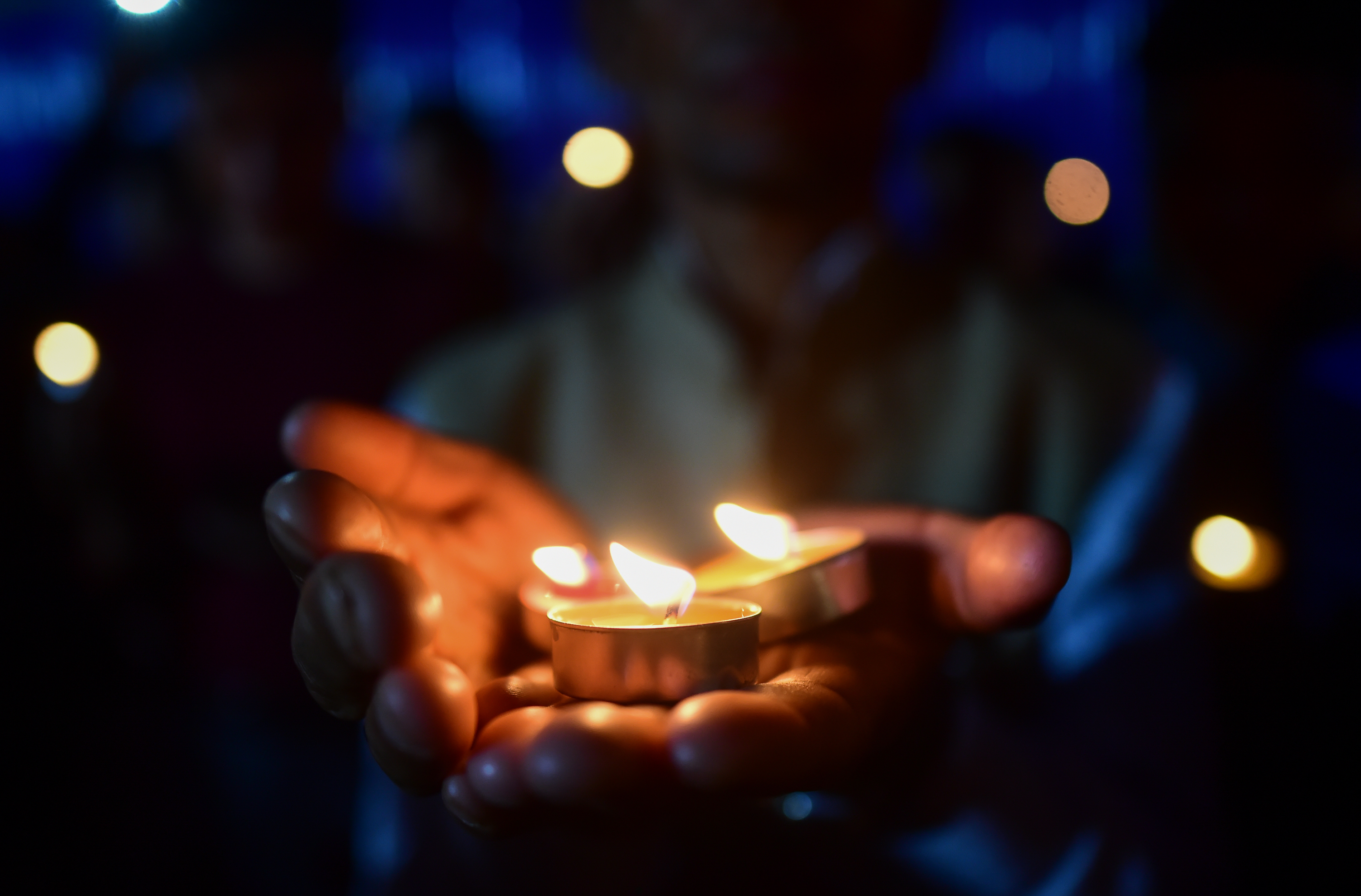 KATHMANDU, NEPAL - SEPTEMBER 03: People gather to take part in a candle ligh vigil to pay tribute to pray for the eternal peace of those who lost their lives in the flood during floods and the speedy recovery for the injured on September 03, 2026 at Buddha Stupa in Kathmandu, Nepal. The floods, triggered by a glacier collapse on Langtang Lirung on August 26, have killed at least 900 people and left nearly 4,000 missing in Nepal as of September 1, with additional deaths and hundreds missing in neighbouring Tibet, authorities have said. (Photo by Ritesh Shukla/Getty Images)