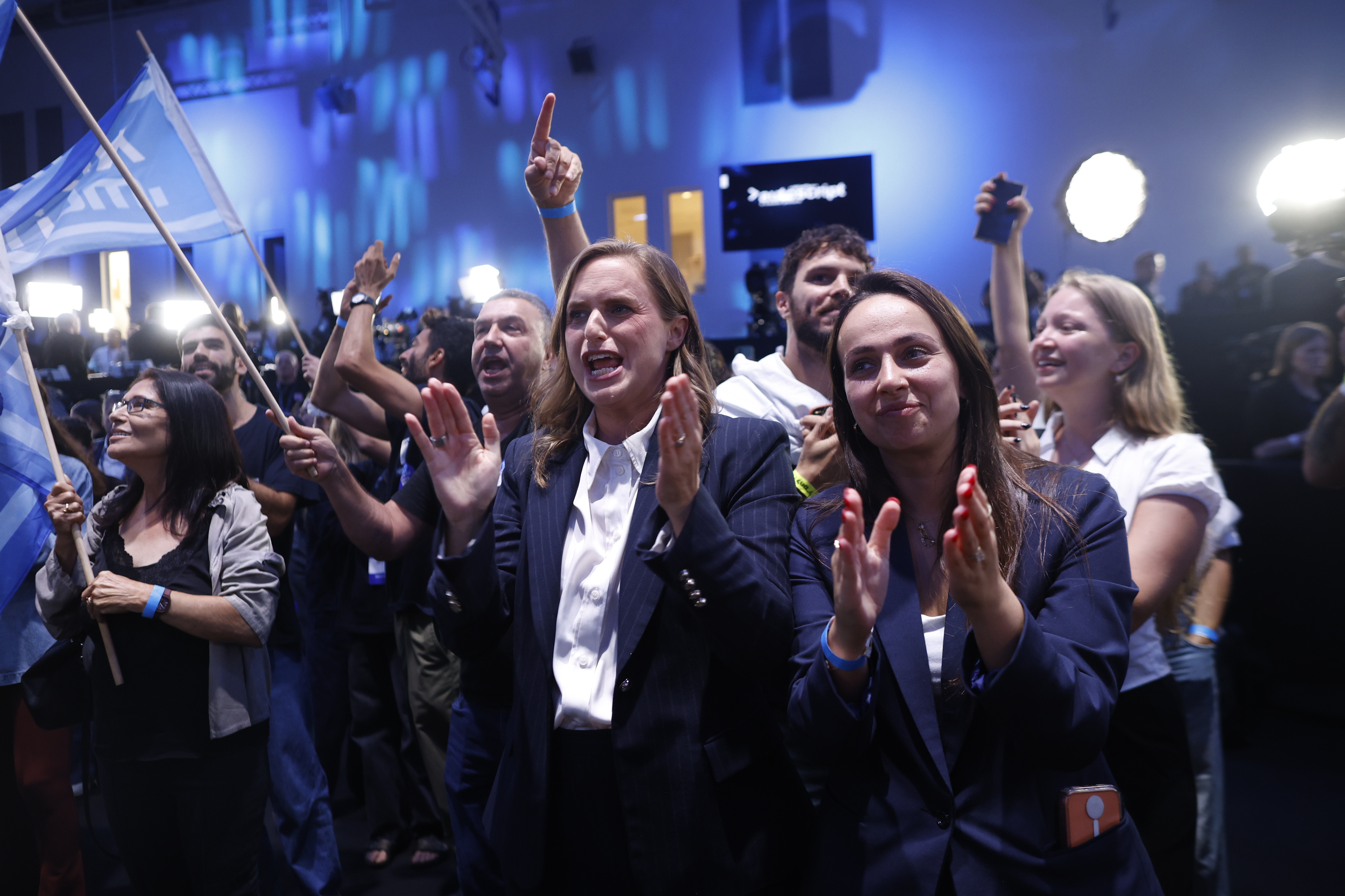 TEL AVIV, ISRAEL - OCTOBER 27: Lianne Pollak-David (C) and Yashar Party members during their election-night event at the National Sports Center on October 27, 2026 in Tel Aviv, Israel. Voters are heading to the polls in Israel to elect 120 members of the Knesset, which will determine the make-up of the government that succeeds incumbent Prime Minister Benjamin Netanyahu's right-wing coalition. The legislative elections are the first to be held since the Hamas-led attacks against Israel on October 7, 2023. (Photo by Amir Levy/Getty Images)