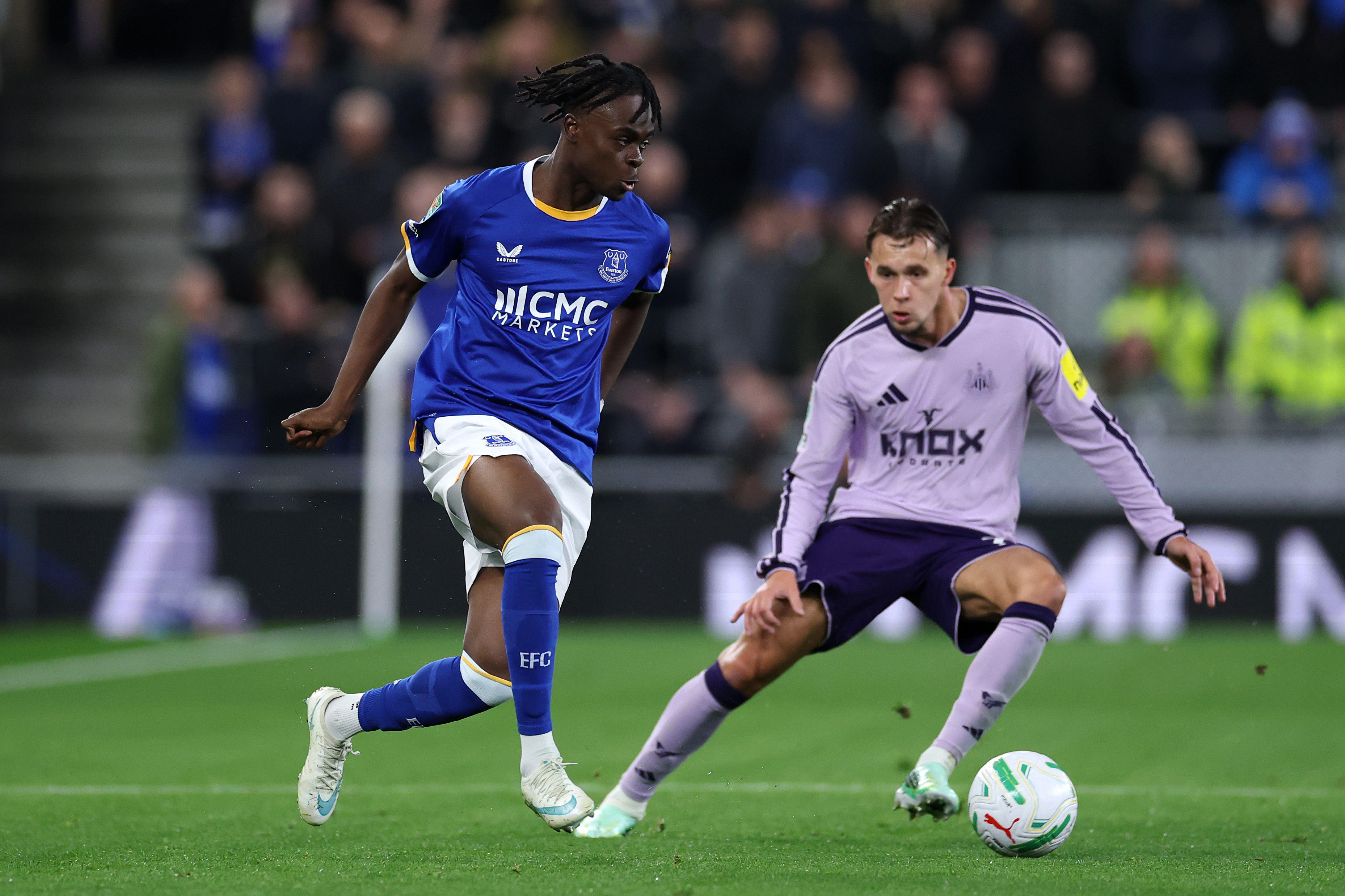 Tyrique George (L) of Everton in action.