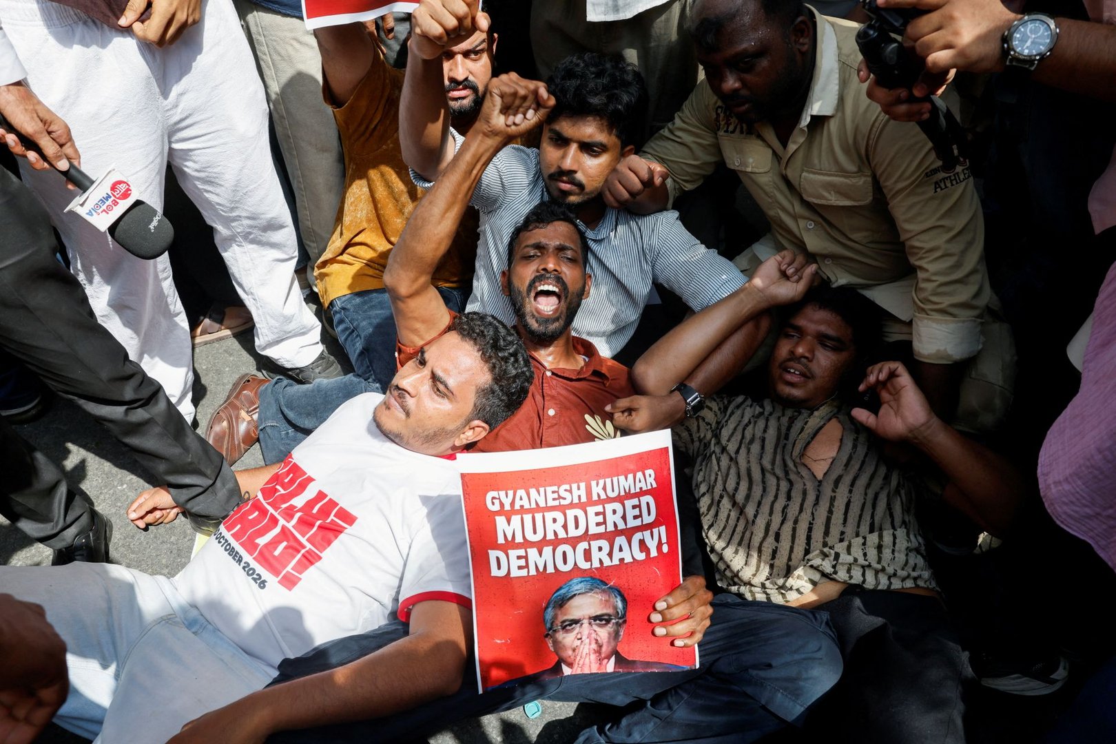 Indian police detain opposition politicians during a protest demanding the resignation of Chief Election Commissioner Gyanesh Kumar in New Delhi