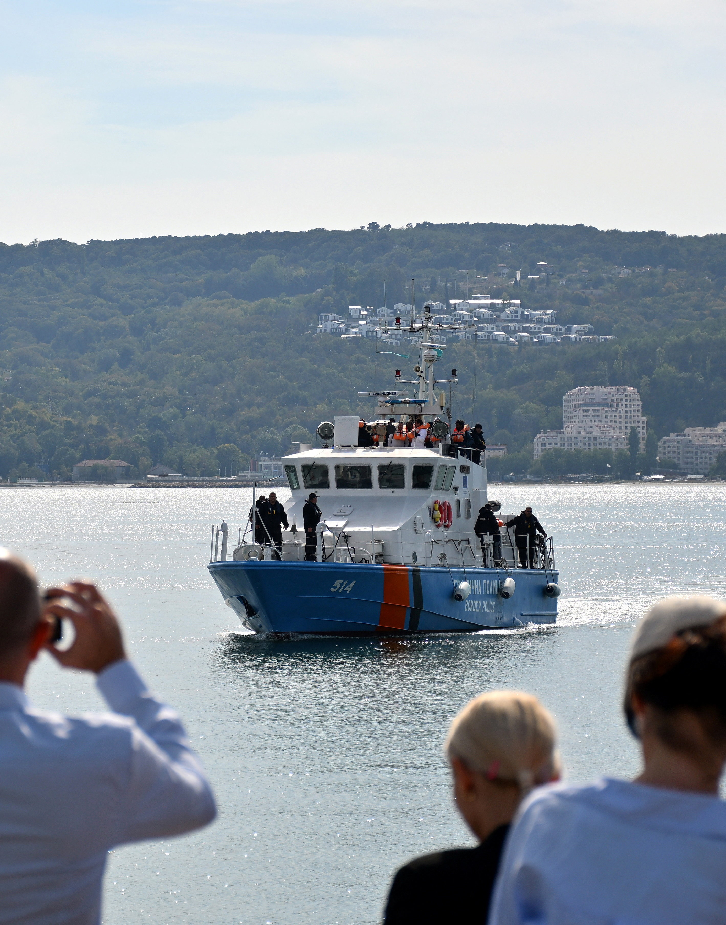 A Bulgarian border police vessel carrying crew members from a ship damaged in a drone attack