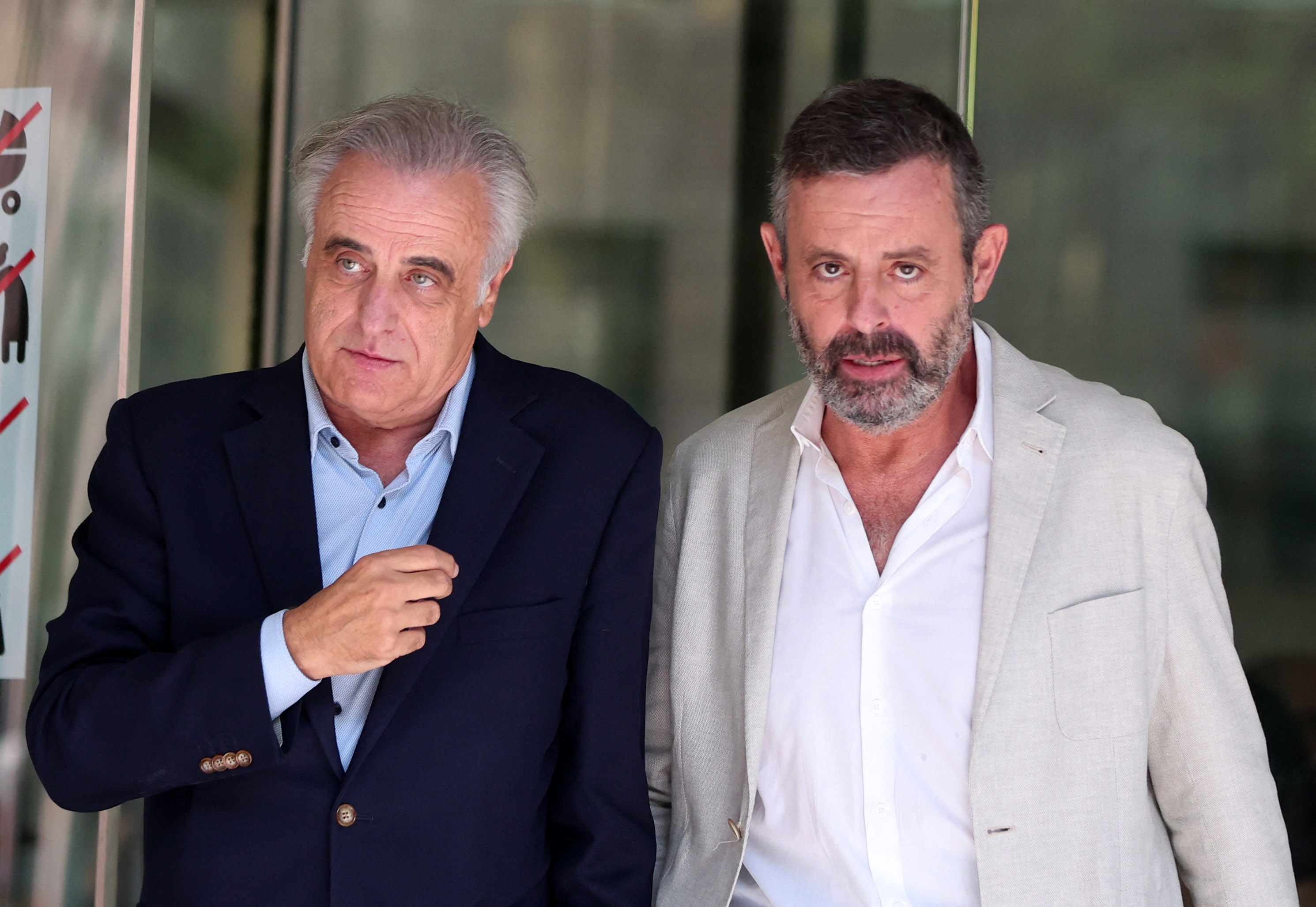 Soccer Football - Former FC Barcelona presidents Rossell and Bartomeu heard in Negreira case - Barcelona Investigation Court, Barcelona, Spain - September 18, 2025 Former FC Barcelona president Sandro Rossell leaves the court after the hearing REUTERS/Bruna Casas