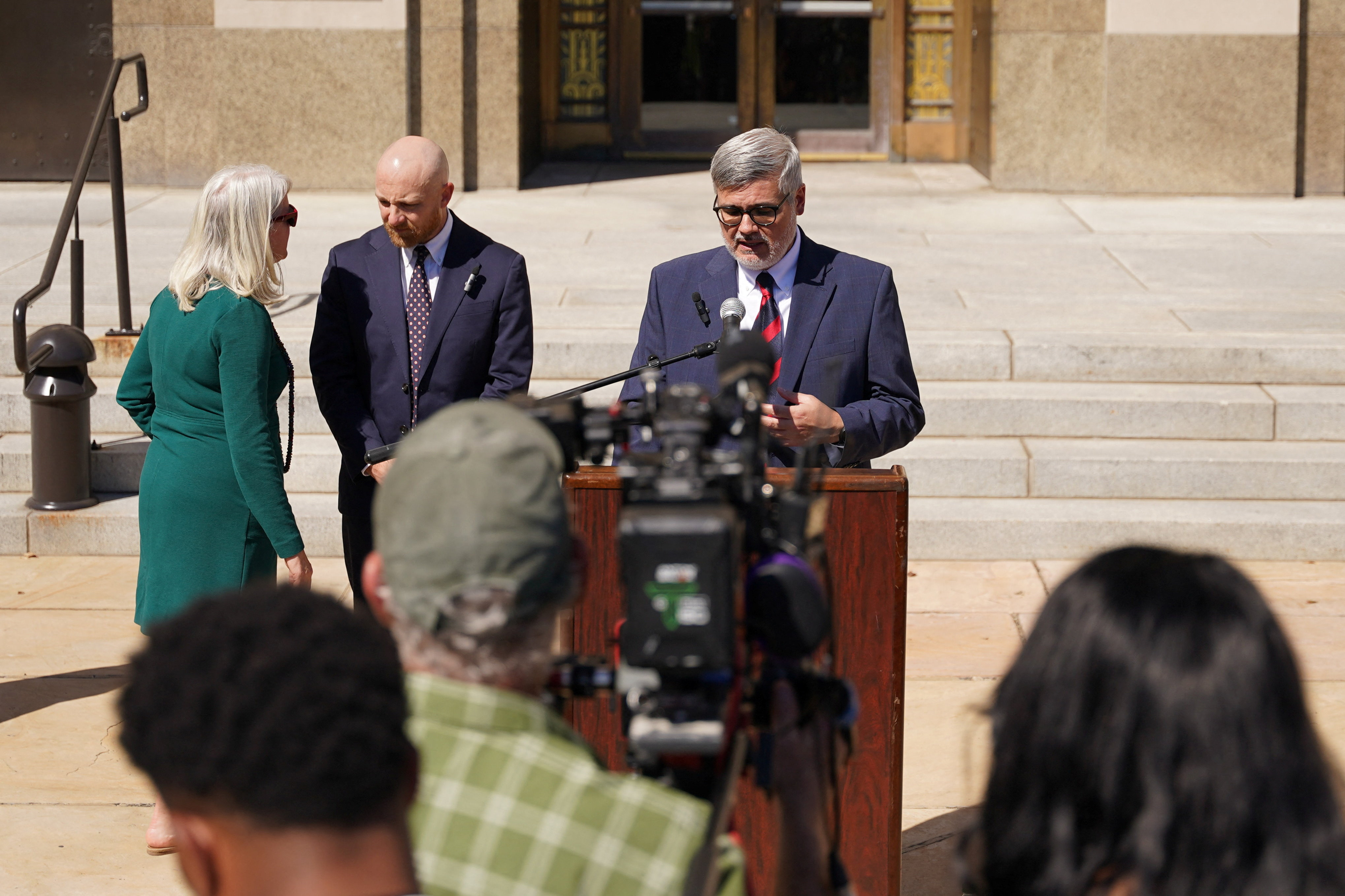 Randy Spivey, an attorney for Christa Pike, a death row prisoner who survived a botched execution, speaks to the media, flanked by Luke Ihnen, after a Tennessee court was presented a status update on Pike, outside a courtroom in Nashville, Tennessee, US, October 7, 2026. REUTERS/Seth Herald