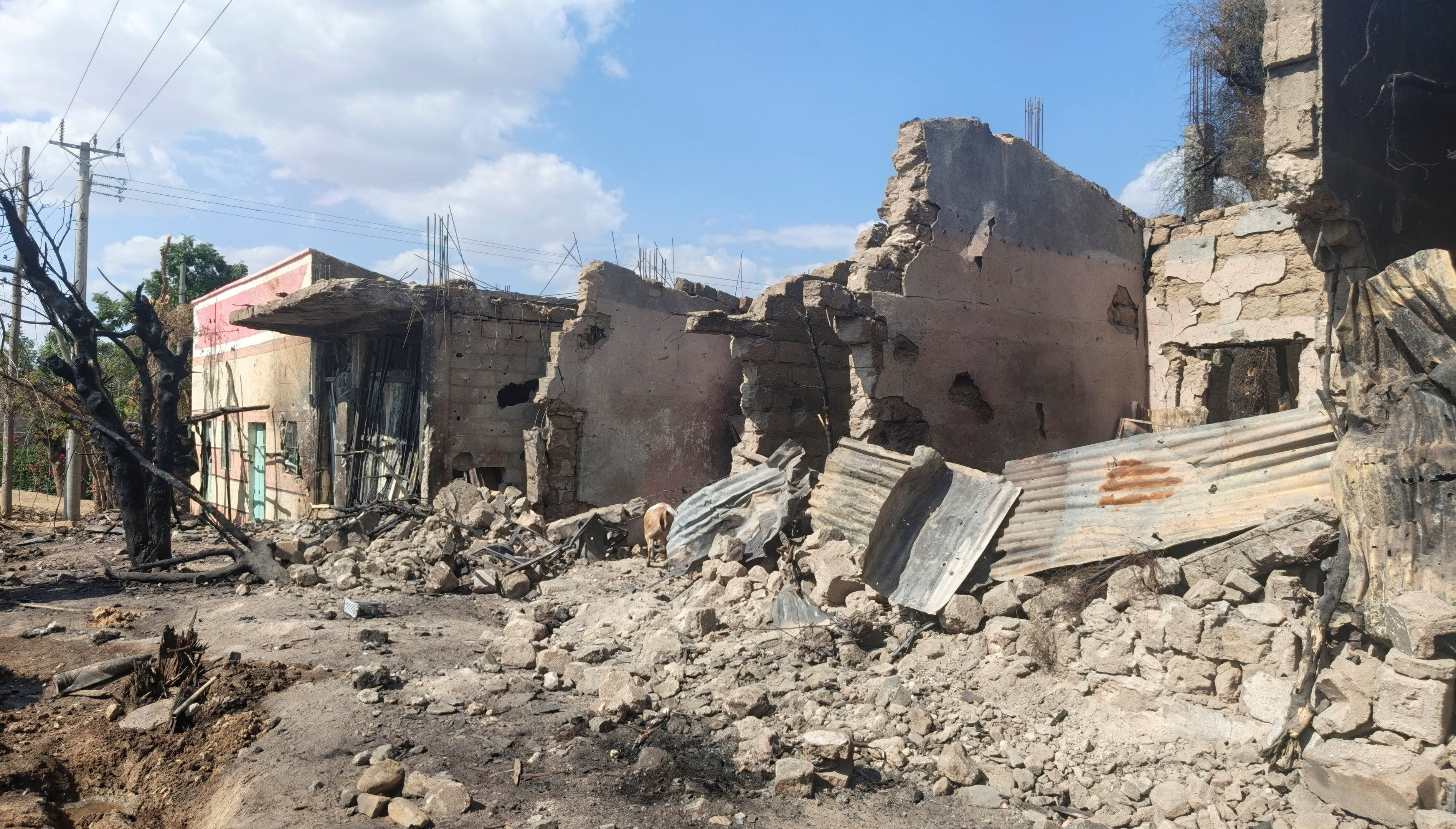 Houses damaged by a drone strike during fighting between the Ethiopian National Defense Force (ENDF) and the Tigray People’s Liberation Front (TPLF) forces in Rama town, near the Eritrean border, Ethiopia, October 15, 2026. Picture taken with a phone. Obtained by Reuters