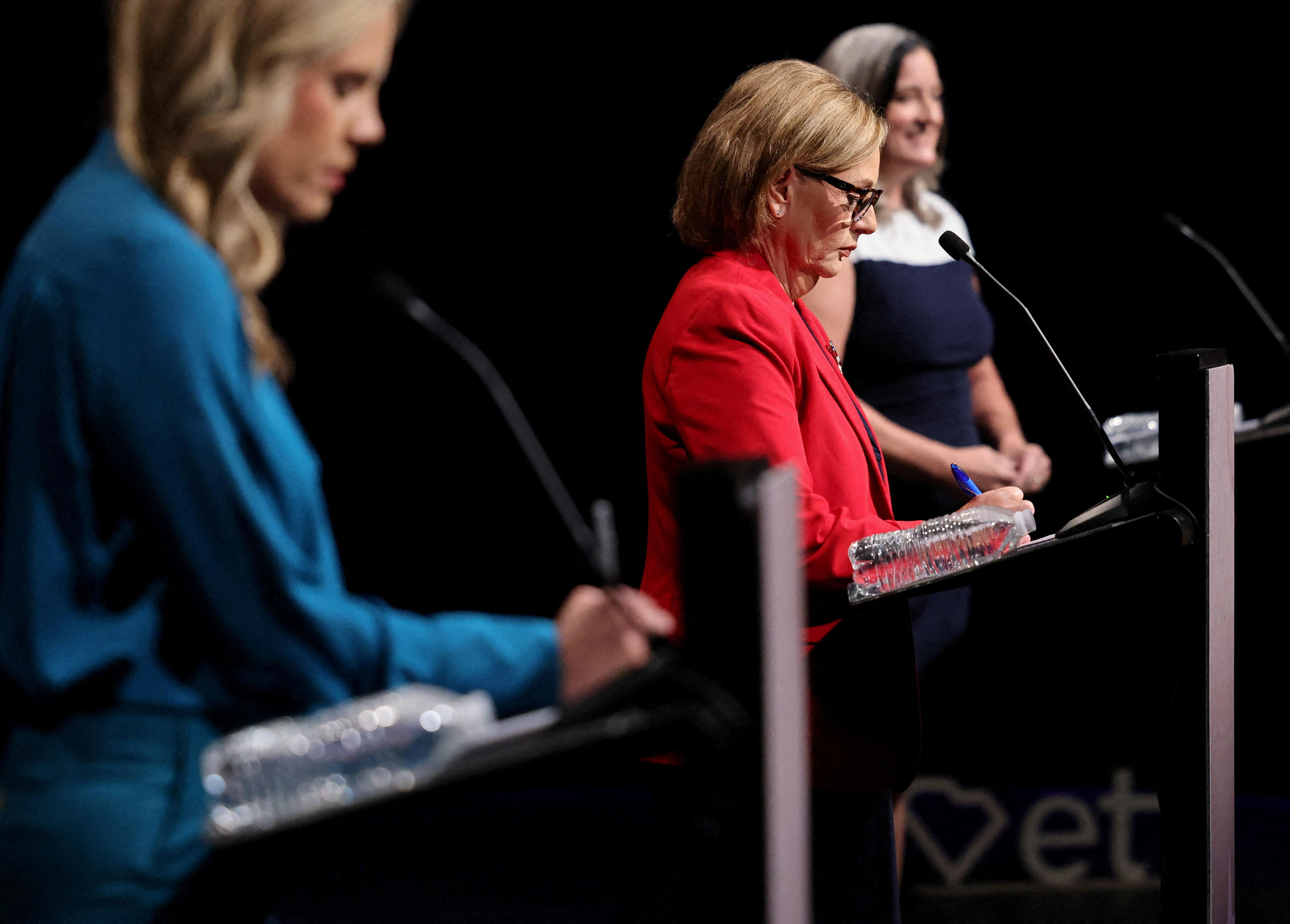 FILE PHOTO: Republican US Senator Darline Graham takes notes before a debate with US Senate Democrat candidate Annie Andrews and US Senate Libertarian candidate Kasie Whitener in Columbia, South Carolina, US, October 11, 2026. REUTERS/Sam Wolfe/File Photo
