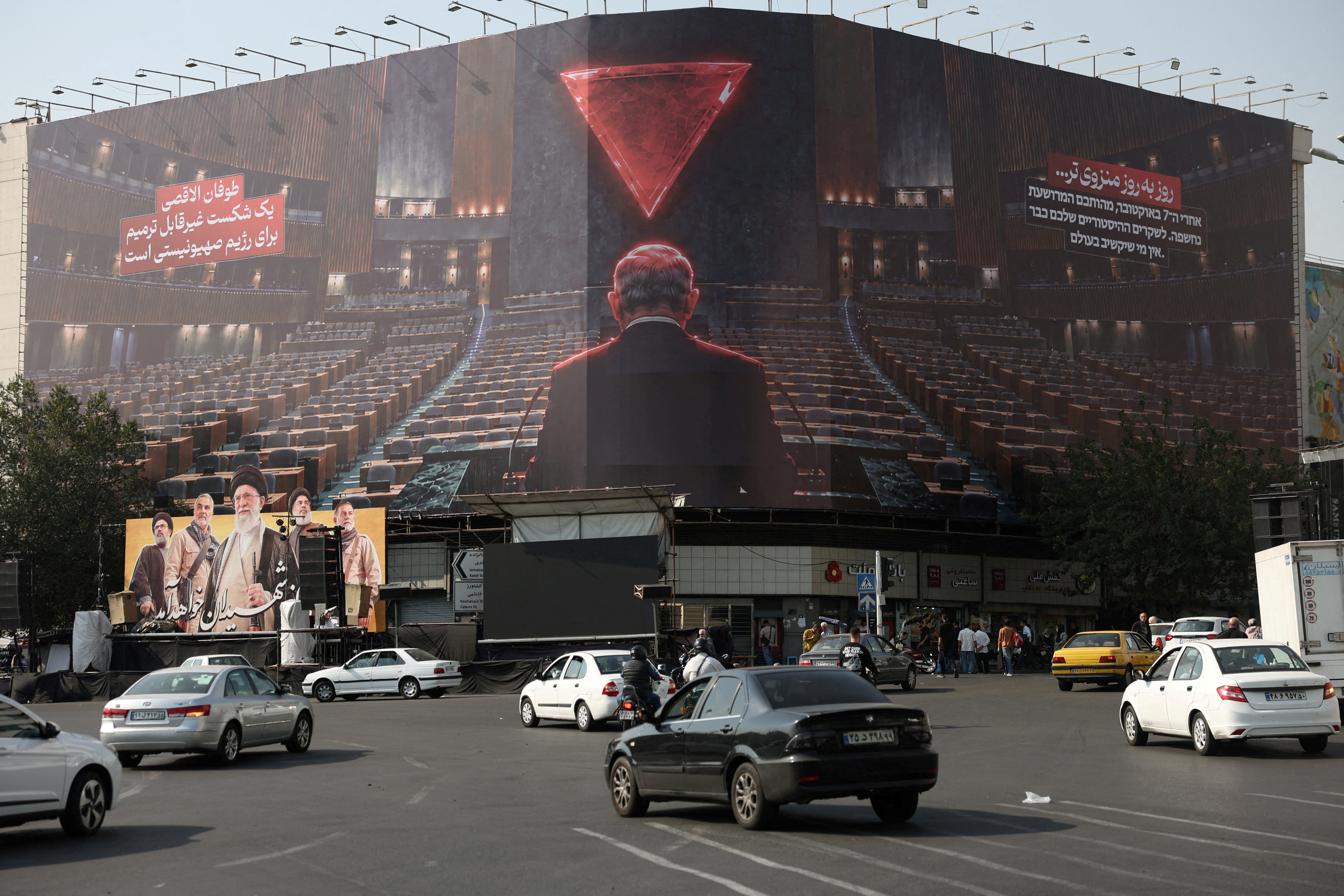 FILE PHOTO: A billboard depicting Israeli Prime Minister Benjamin Netanyahu in the empty hall of the United Nations, on a building in Tehran, Iran, October 13, 2026. Majid Asgaripour/WANA (West Asia News Agency) via REUTERS ATTENTION EDITORS - THIS PICTURE WAS PROVIDED BY A THIRD PARTY. ISRAEL OUT. NO COMMERCIAL OR EDITORIAL SALES IN ISRAEL. NO ACCESS FOR ISRAELI MEDIA. NO USE BBC PERSIAN. NO USE VOA PERSIAN. NO USE MANOTO. NO USE IRAN INTERNATIONAL. NO USE RADIO FARDA. DIGITAL: NO USE BBC PERSIAN. NO USE VOA PERSIAN. NO USE MANOTO. NO USE IRAN INTERNATIONAL. NO USE RADIO FARDA./File Photo