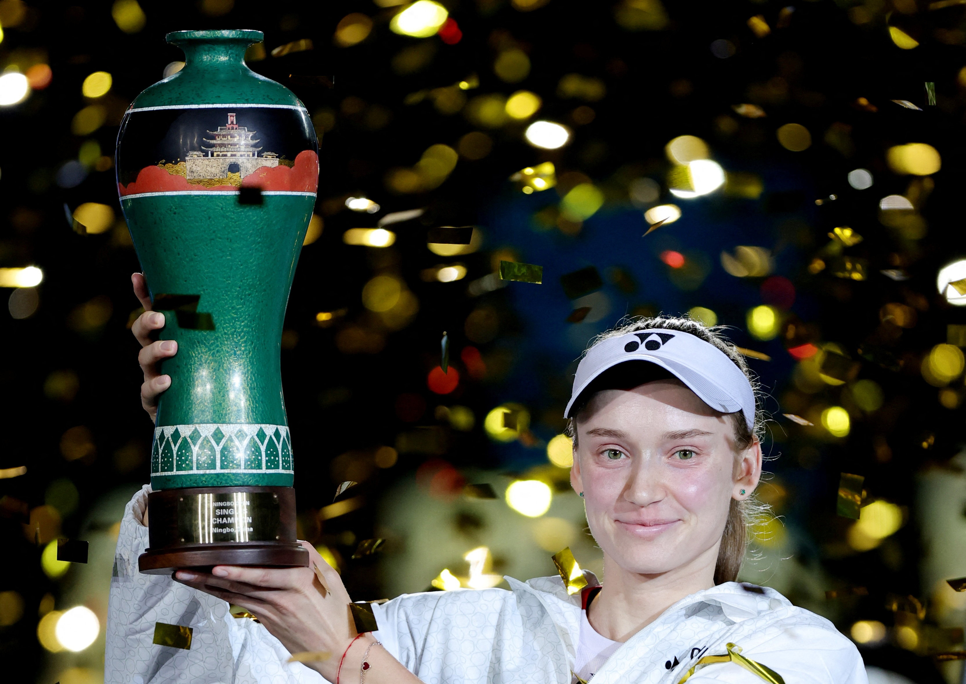 Tennis - WTA 500 - Ningbo Open - Yinzhou Tennis Center, Ningbo, China - October 25, 2026 Kazakhstan's Elena Rybakina celebrates with the trophy after winning the final against Canada's Leylah Fernandez REUTERS/Athit Perawongmetha TPX IMAGES OF THE DAY