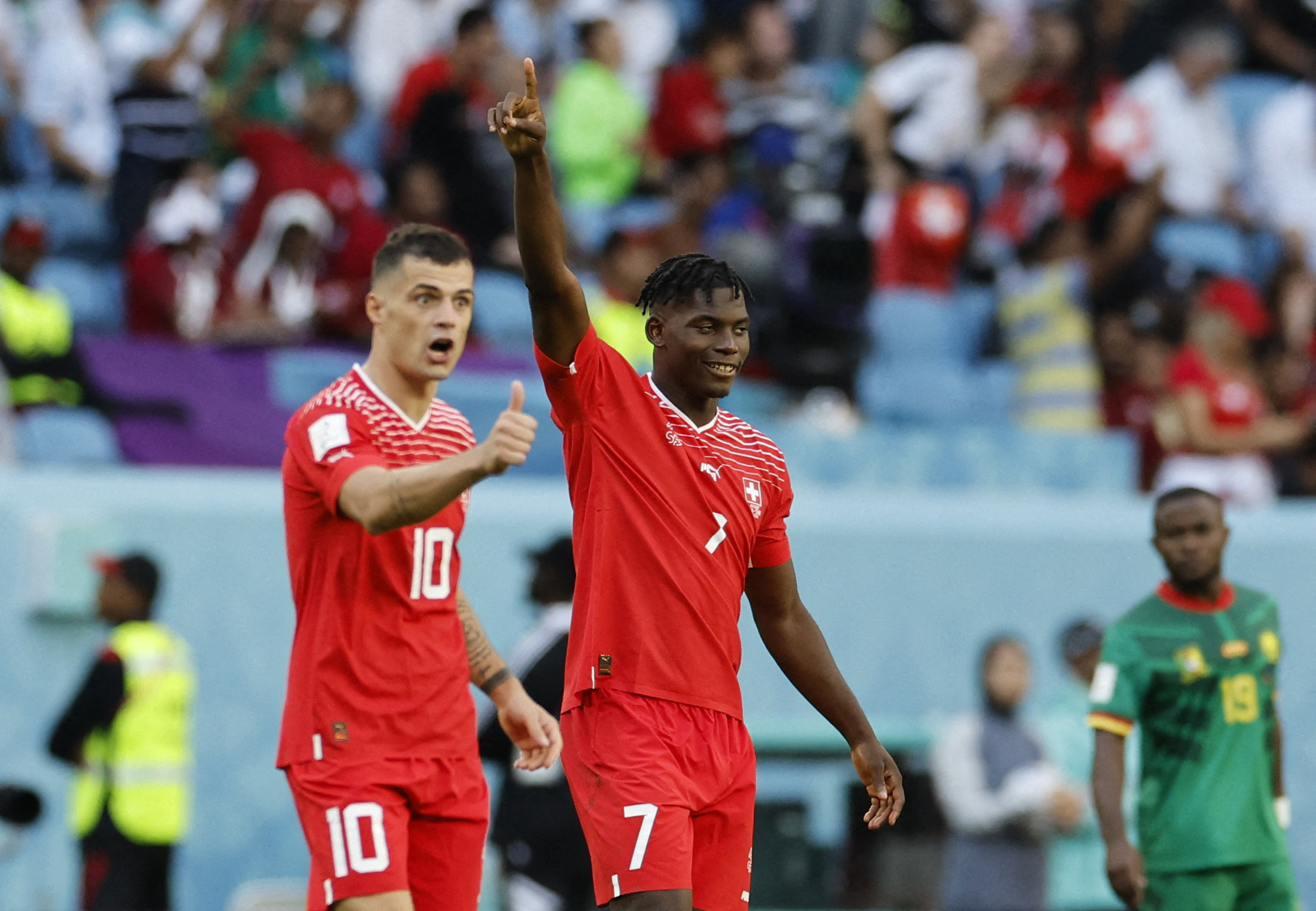 Soccer Football - FIFA World Cup Qatar 2022 - Group G - Switzerland v Cameroon - Al Janoub Stadium, Al Wakrah, Qatar - November 24, 2022 Switzerland's Breel Embolo celebrates scoring their first goal with Granit Xhaka REUTERS/Issei Kato